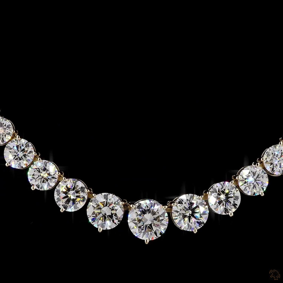17.79 Ct Round Brilliant Cut diamonds arranged in a dramatic graduated layout tapering toward the back