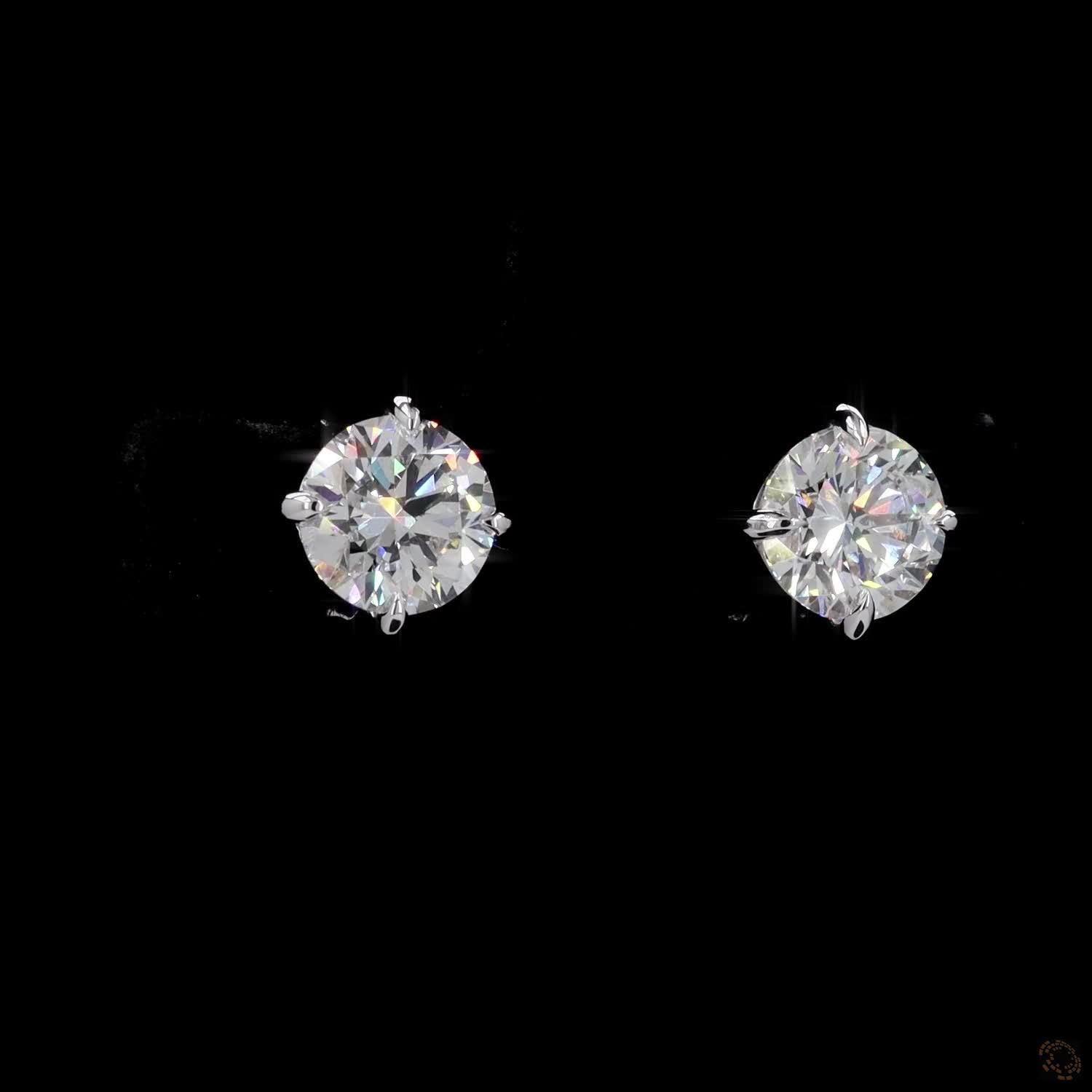 2.14 Ct The shiny white gold bezel creates an illusion of a larger diamond diameter by extending the bright, reflective border outward