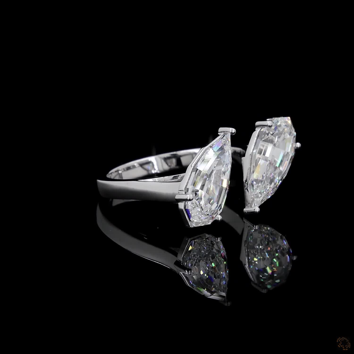 4.38 Ct Open cuff band with individually set basket prongs and protective V-prongs on the tips