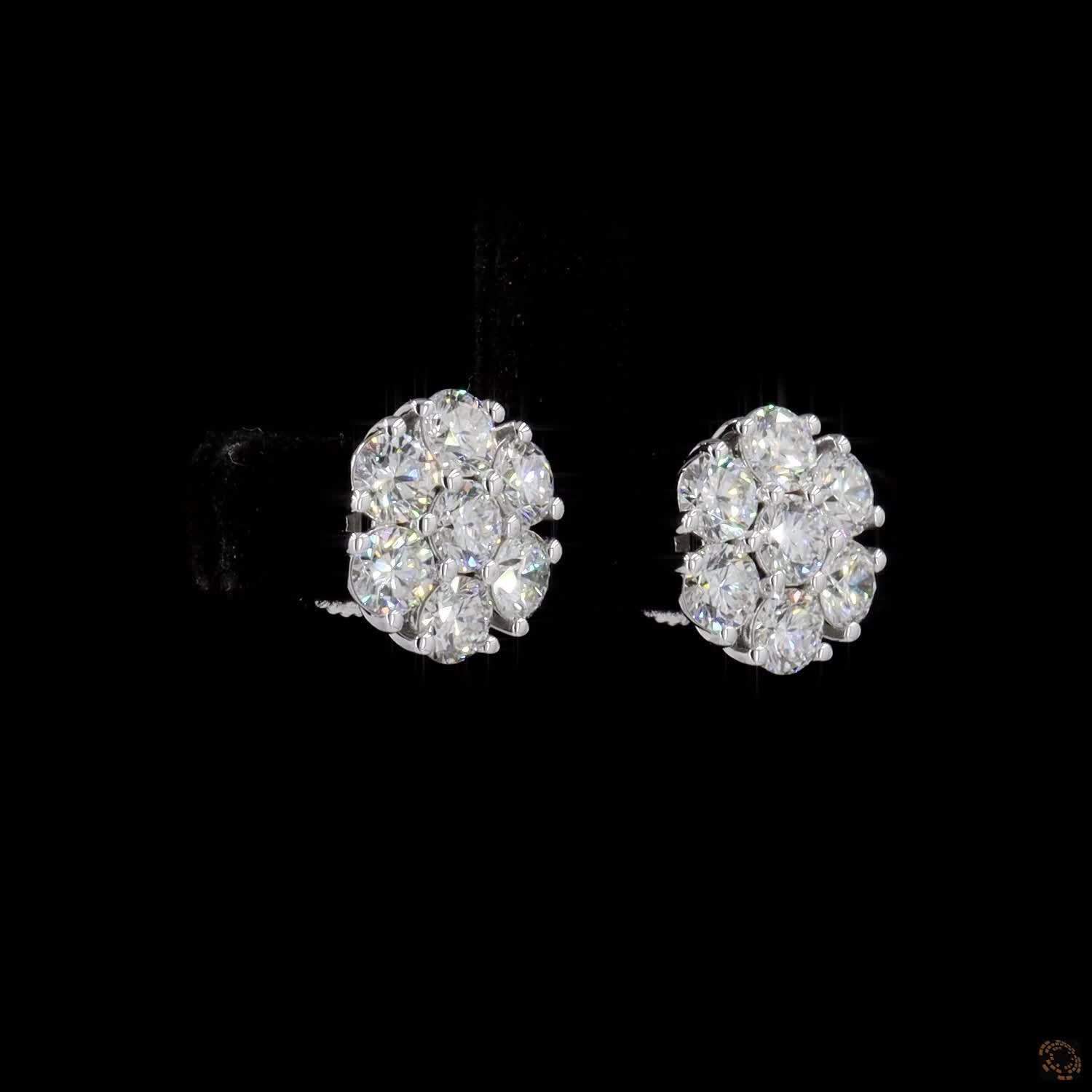 2.2 Ct Round Brilliant Cut Central diamond framed by a floral halo of round diamonds
