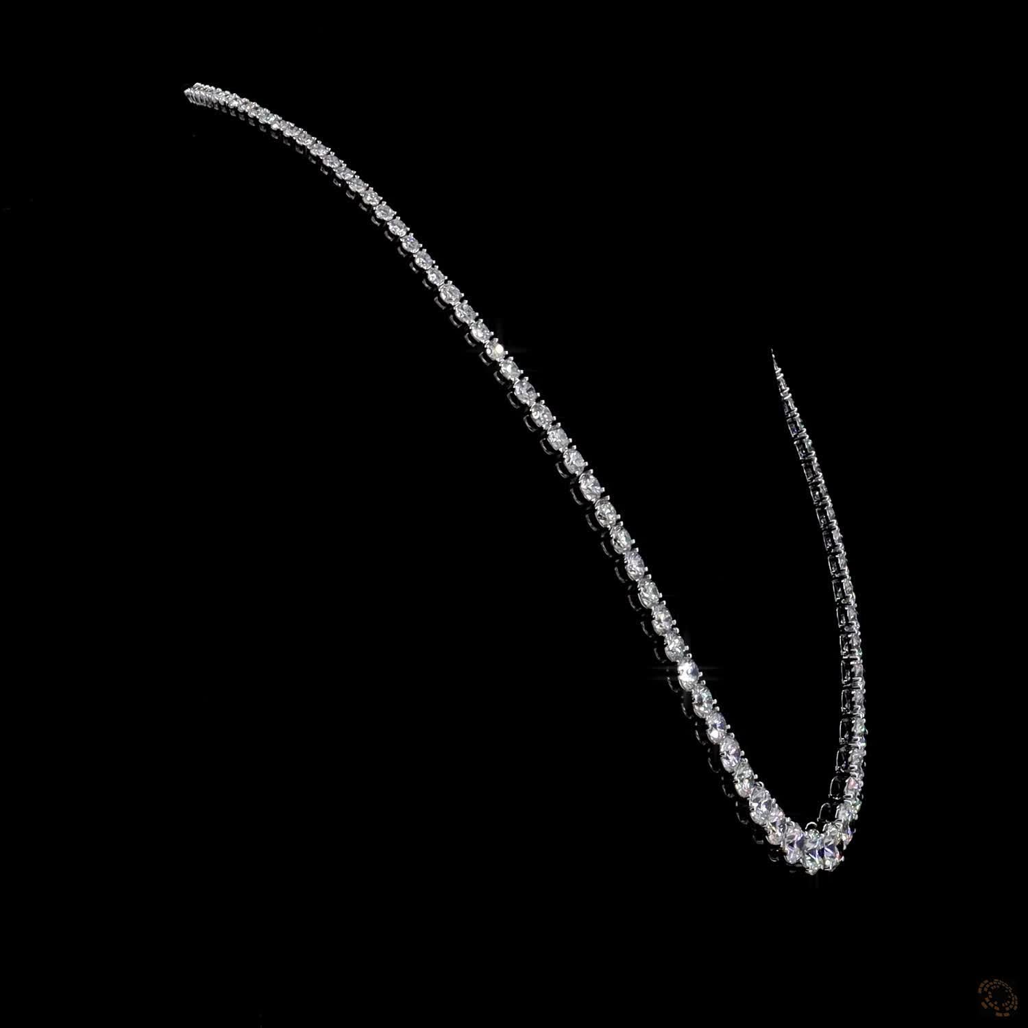 29.02 Ct Round Brilliant Cut diamonds seamlessly graduated from prominent center stones down to smaller accent stones toward the clasp