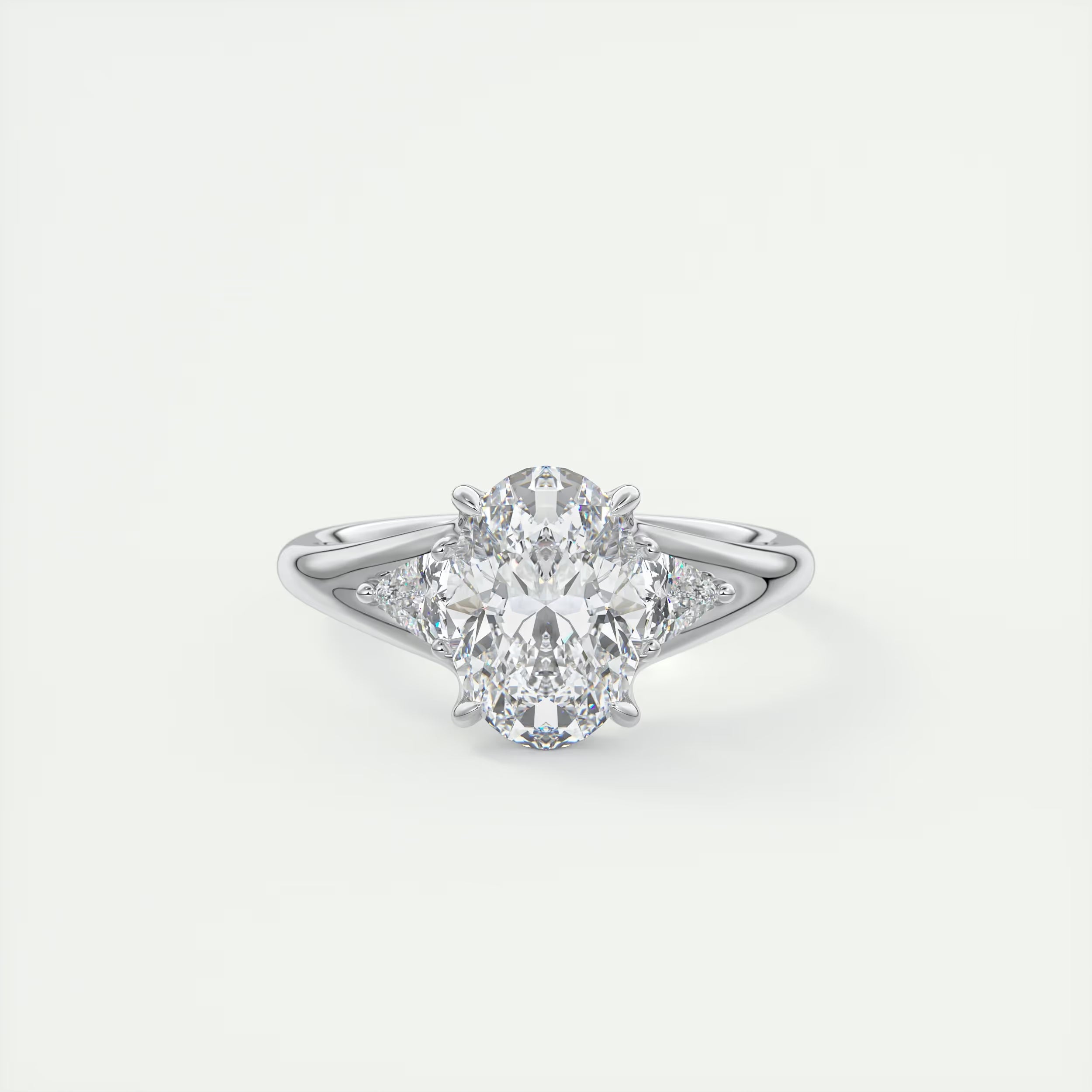 2.30 Ct The Center Stone Oval  & Side Stone Trilliant Split Shank Three Stone Engagement Rings