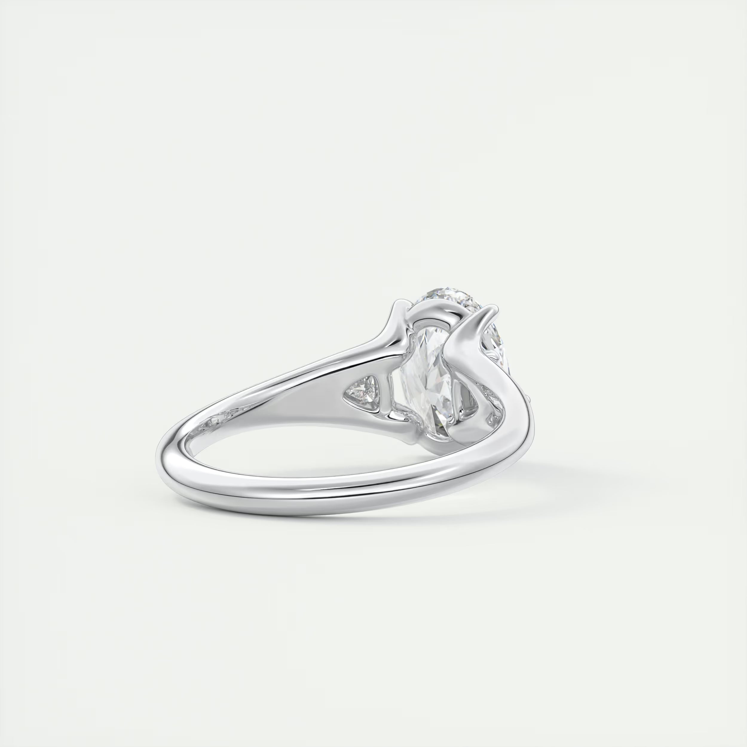 2.30 Ct The Center Stone Oval  & Side Stone Trilliant Split Shank Three Stone Engagement Rings