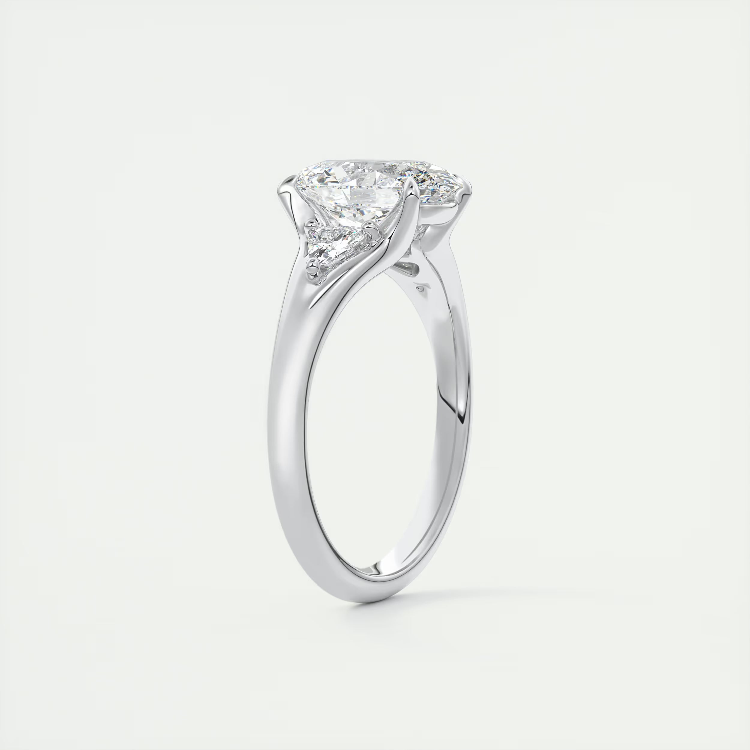 2.30 Ct The Center Stone Oval  & Side Stone Trilliant Split Shank Three Stone Engagement Rings