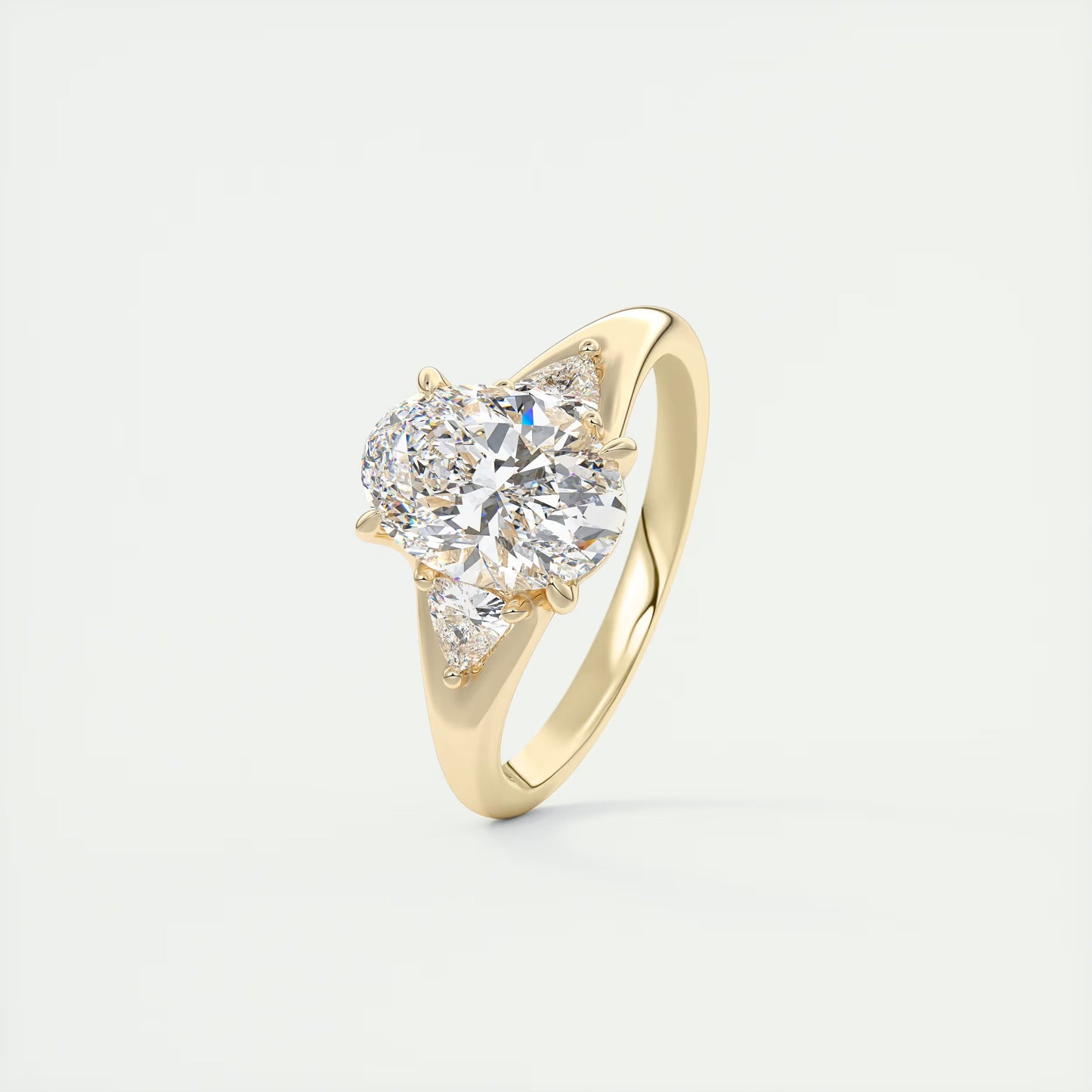 2.30 Ct The Symphony Oval  & Trilliant Split Shank Three Stone Engagement Rings