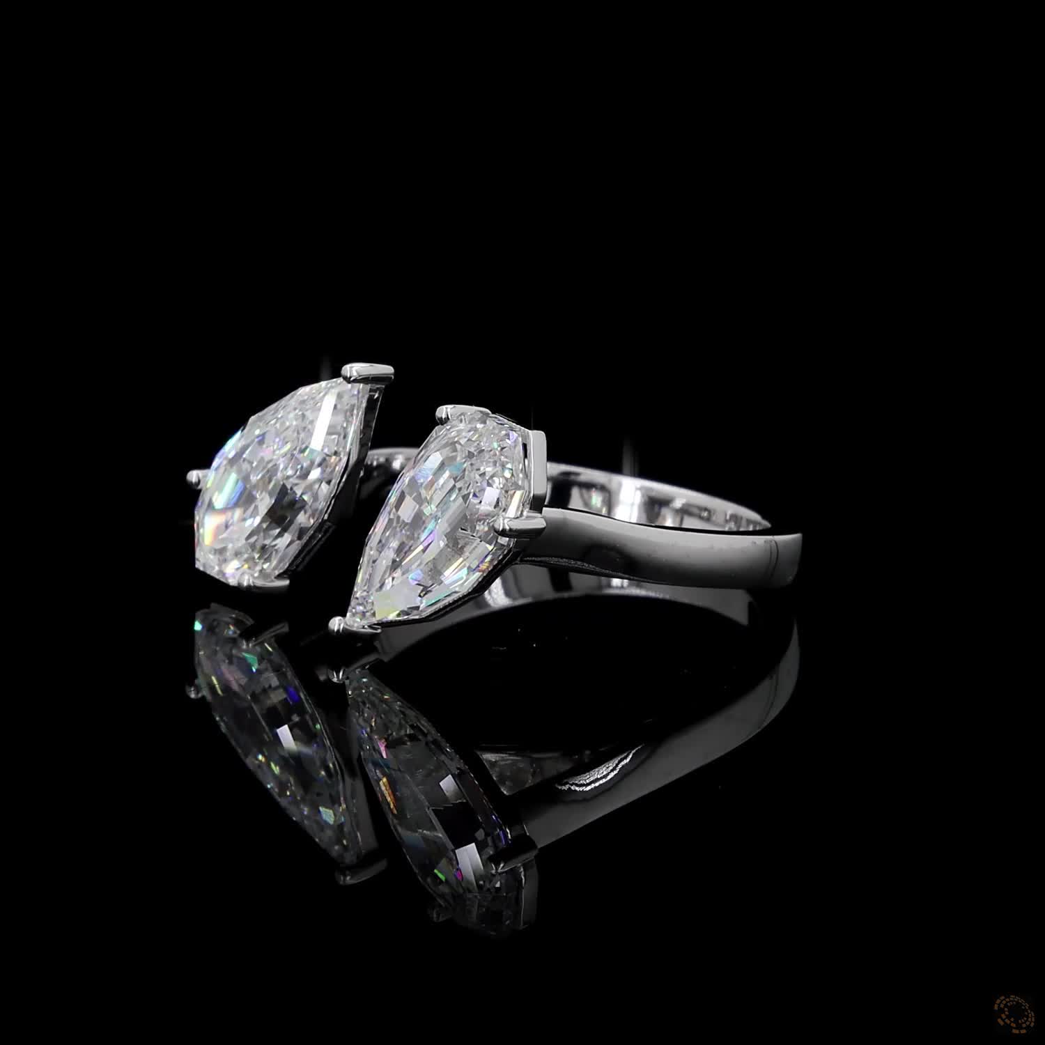 4.38 Ct Open cuff band with individually set basket prongs and protective V-prongs on the tips