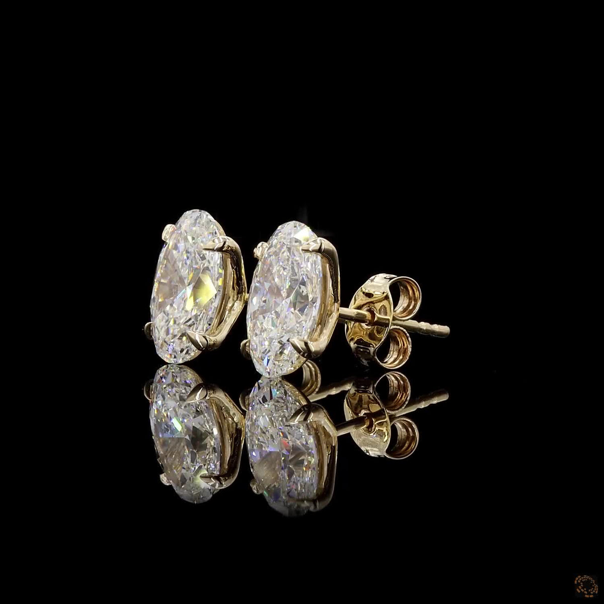 4.16 Ct Four-Prong Oval Cut Diamond Stud Earrings in Yellow Gold