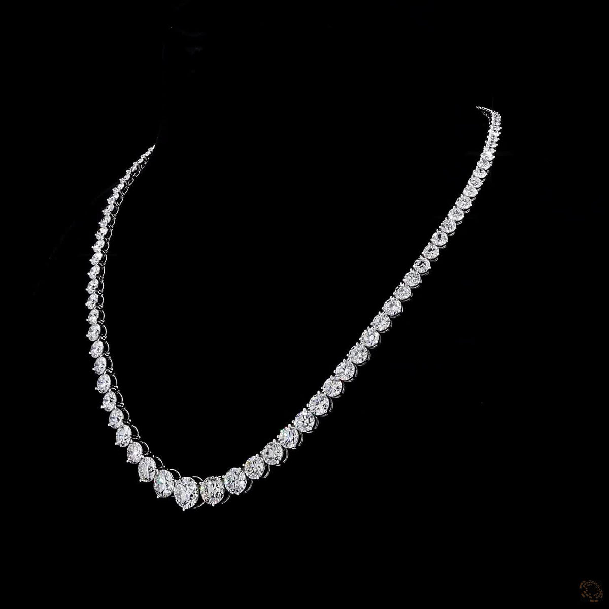 38.58 Ct Experience sleek, dynamic luxury with this bezel-set graduated round-cut diamond tennis necklace