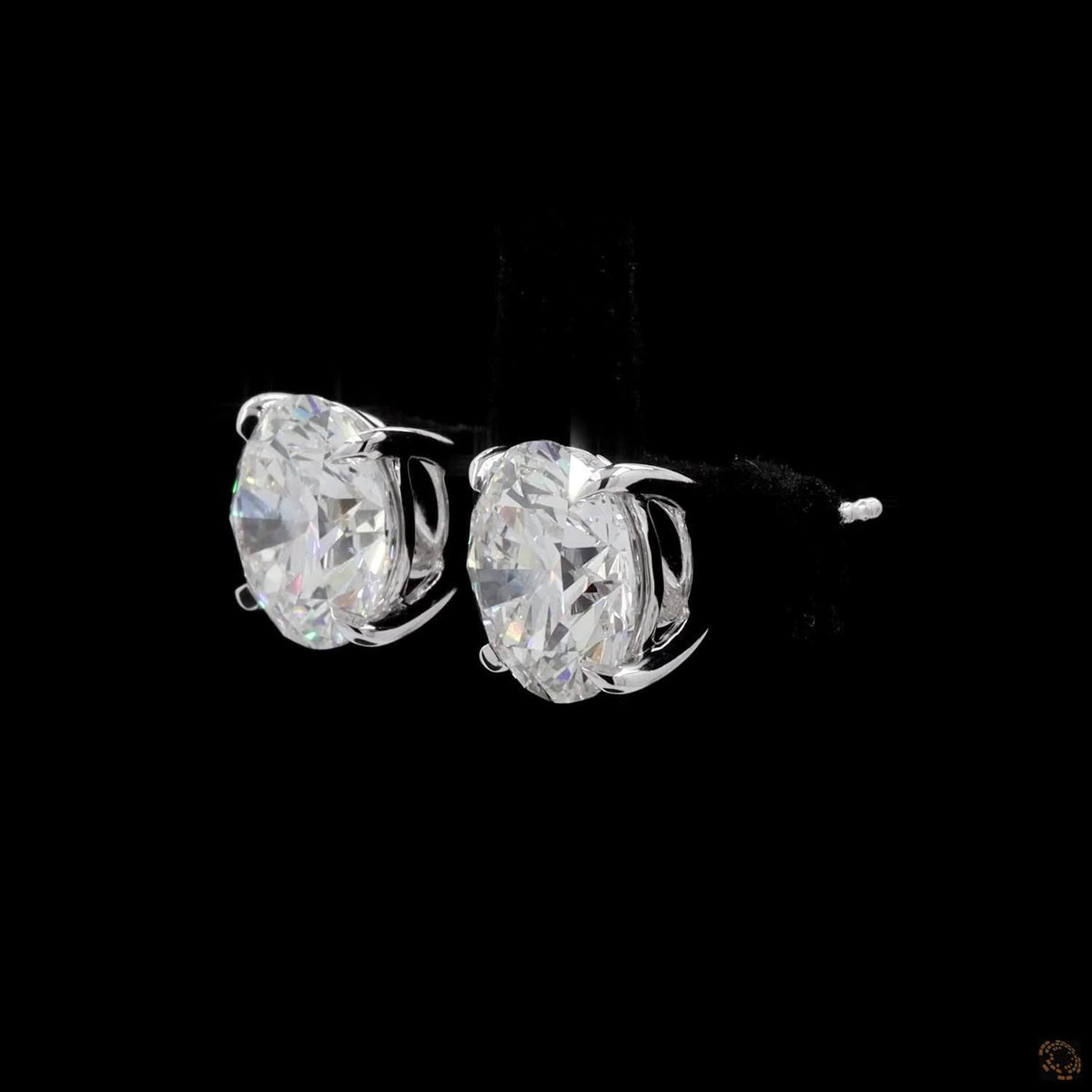 8.02 Ct A precise metal border fully encircles each diamond girdle, keeping the edges protected from bumps or chipping
