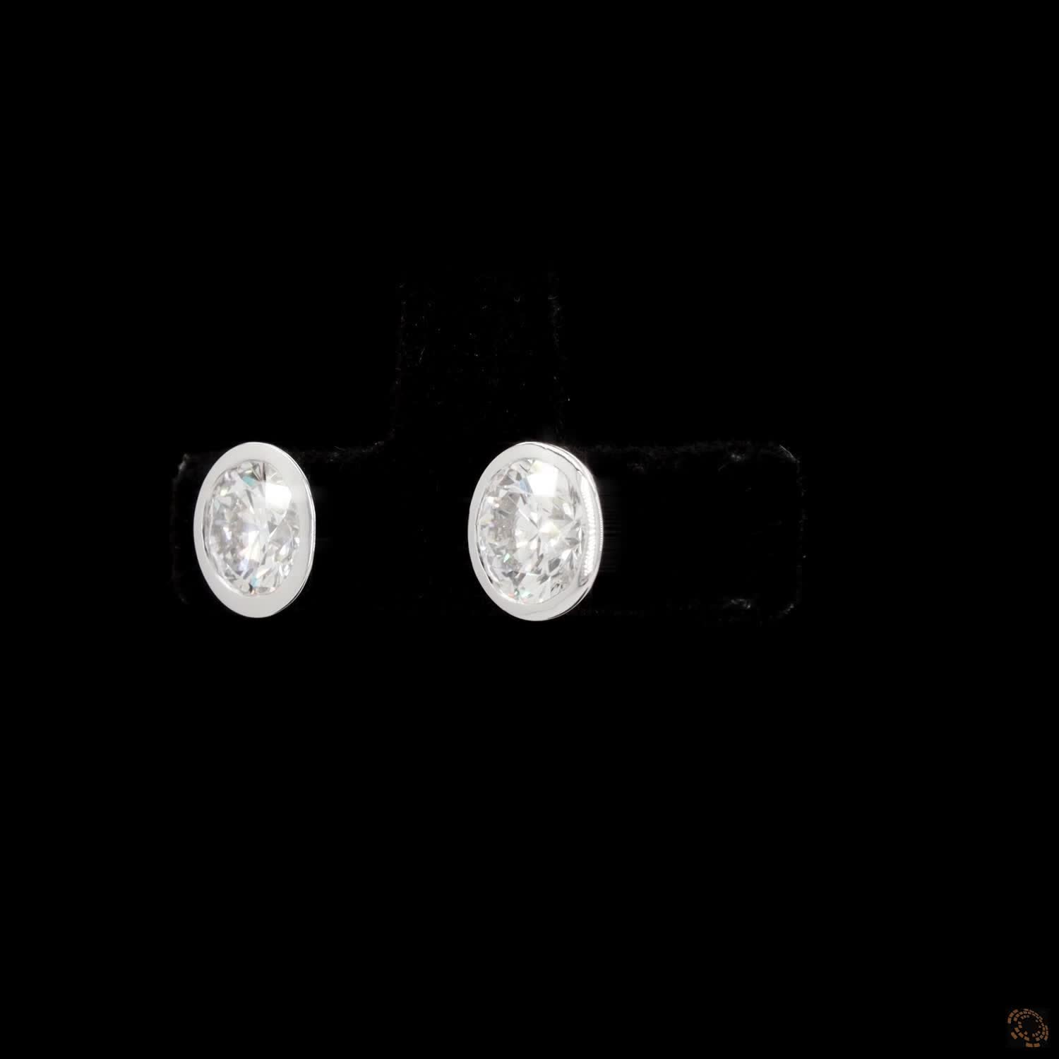 2.21 Bezel-Set Oval Cut Diamond Stud Earrings in White Gold