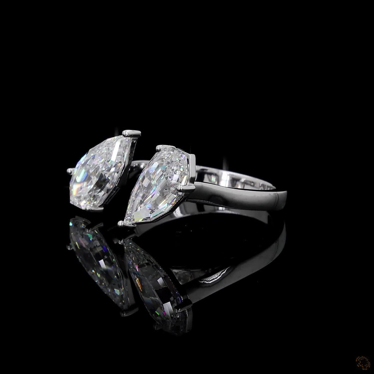 4.38 Ct Open cuff band with individually set basket prongs and protective V-prongs on the tips