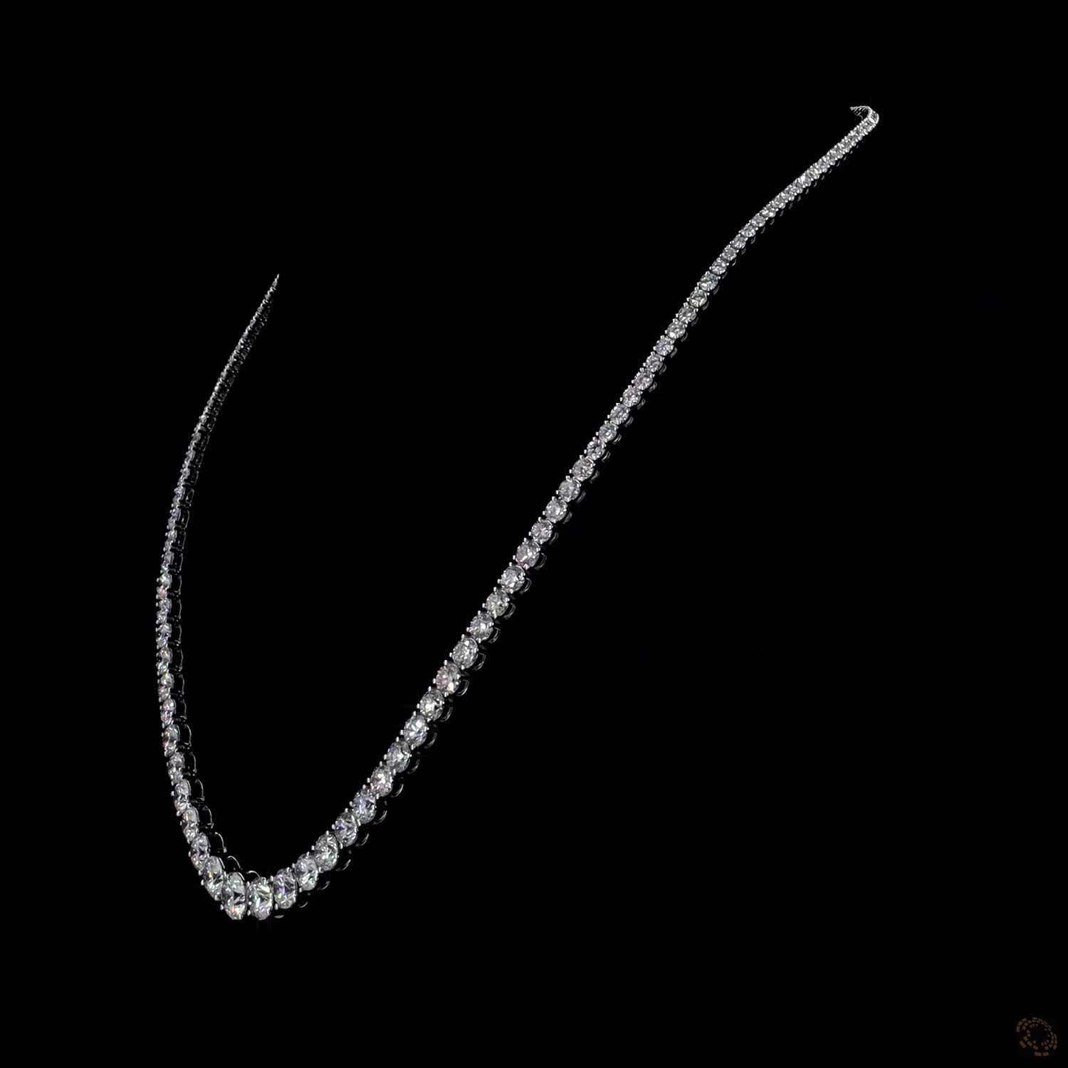 21.24 Ct Round Brilliant Cut diamonds arranged in a subtle, continuous graduated layout that tapers smoothly toward the back