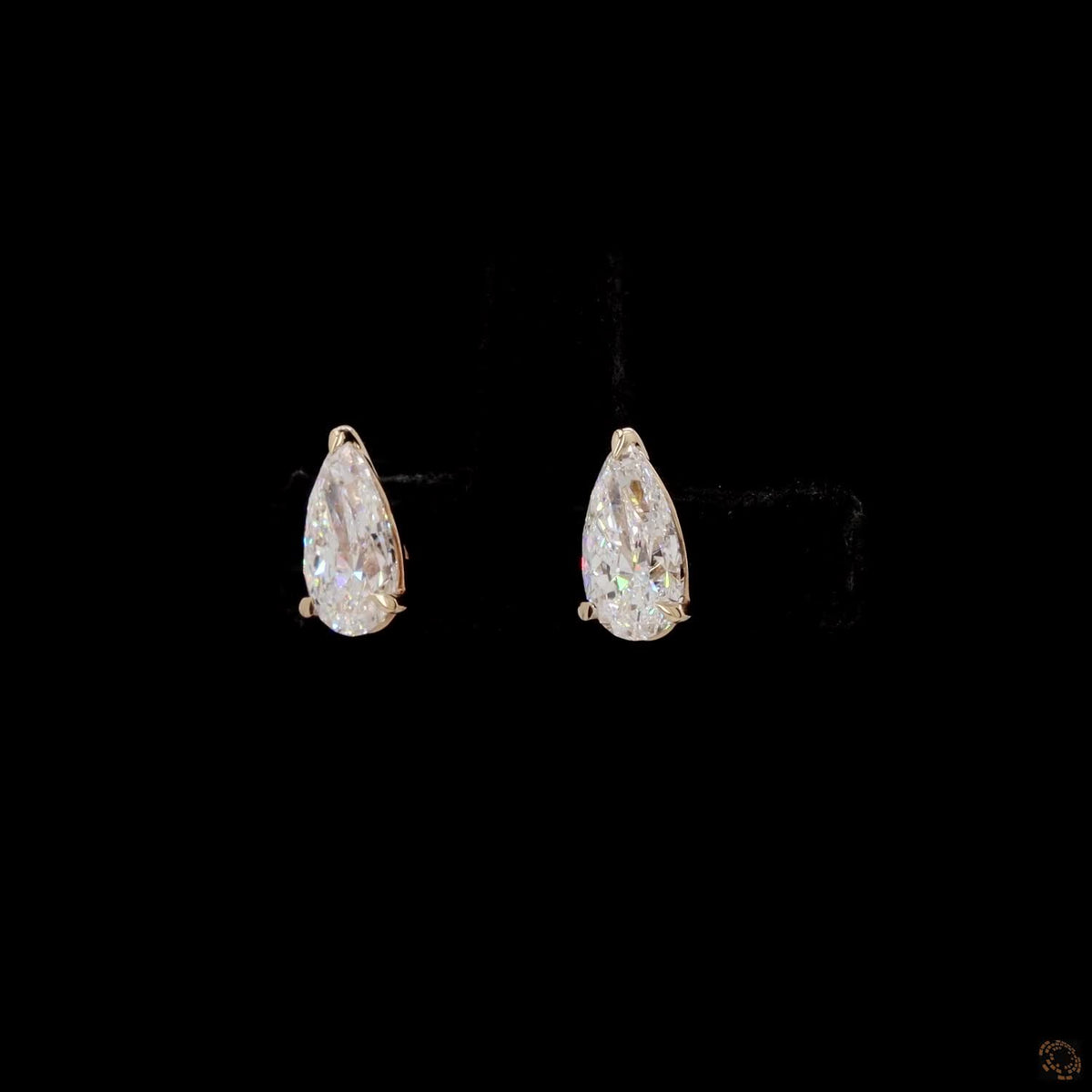 2.01 Ct Three-Prong Pear Cut Diamond Stud Earrings in Yellow Gold