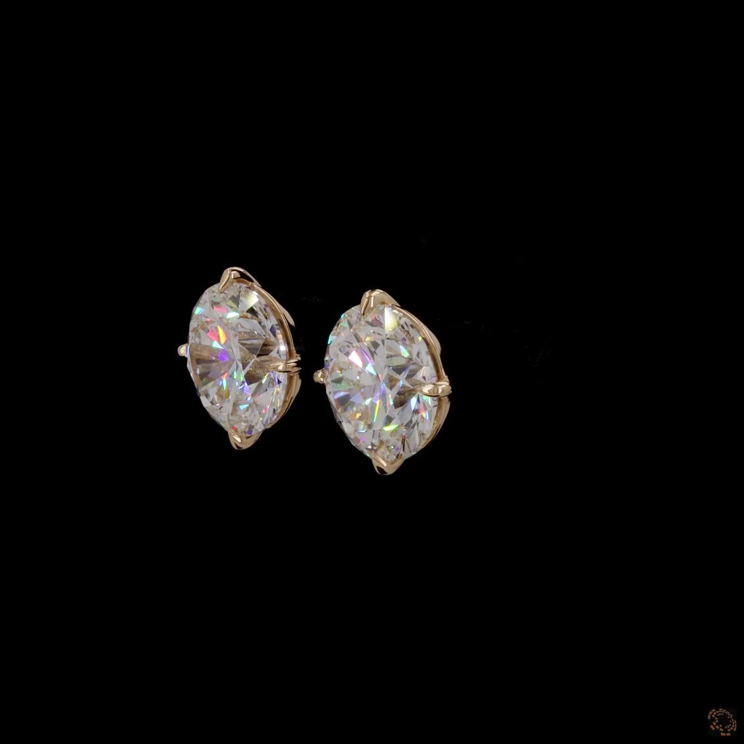 12.14 Ct High-clarity Round Brilliant Cut diamonds showing intense fire and brilliance