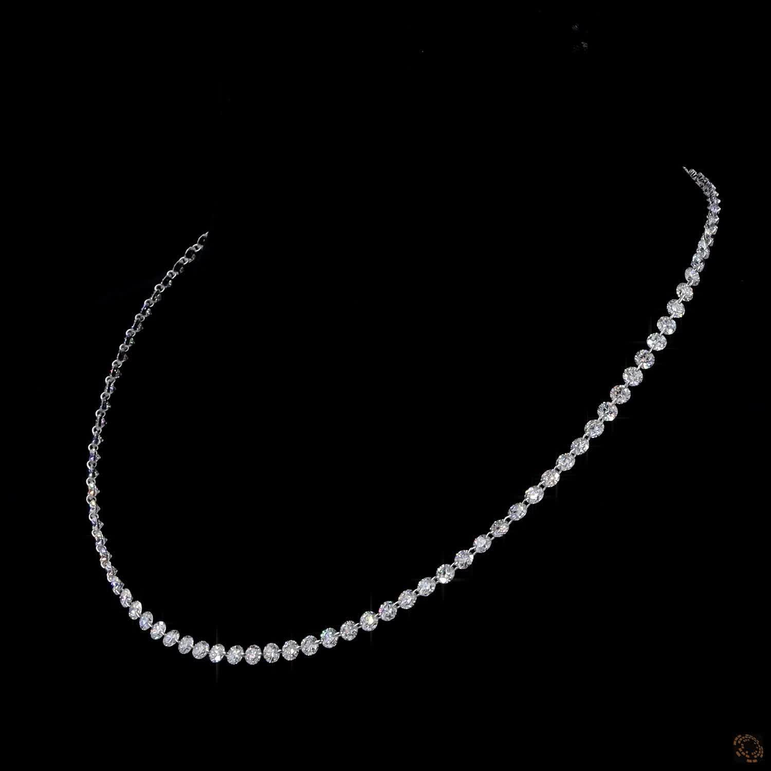 9.78 Ct Half-graduated tennis necklace featuring a continuous row of round brilliant diamonds that gracefully enlarge along the front drop