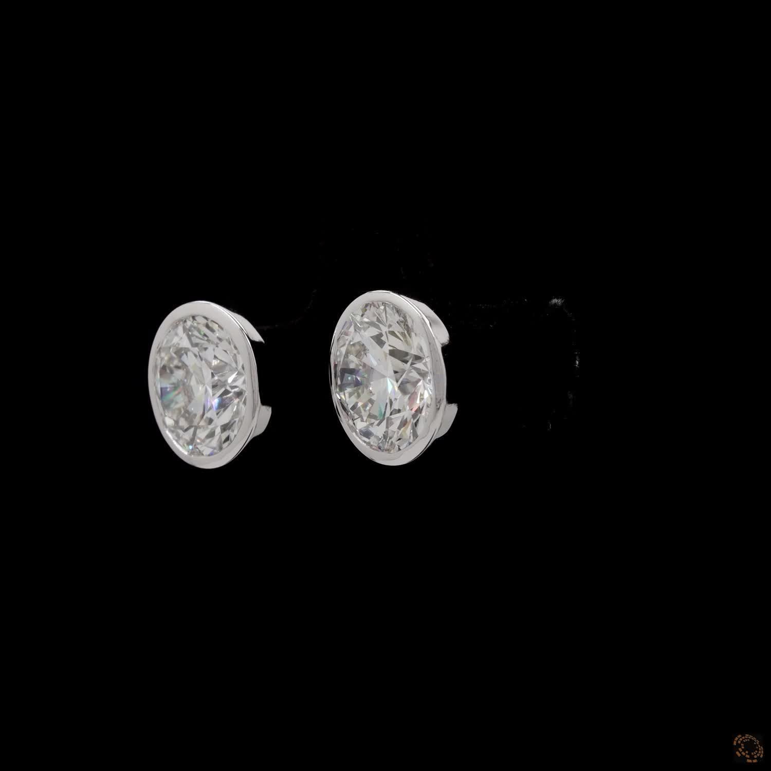 5.08 Modern Bezel-Set Oval Diamond Studs in Platinum / White Gold