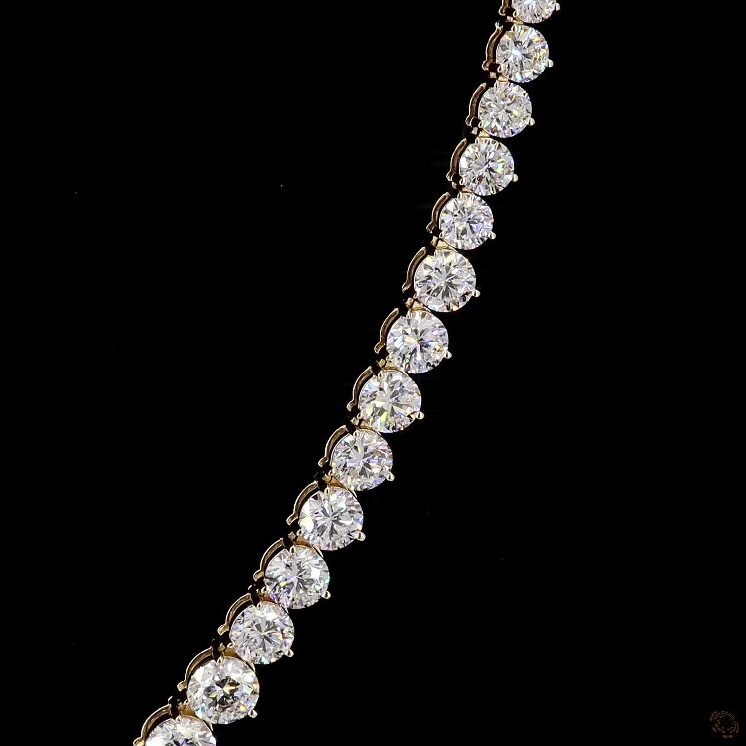 17.79 Ct Round Brilliant Cut diamonds arranged in a dramatic graduated layout tapering toward the back