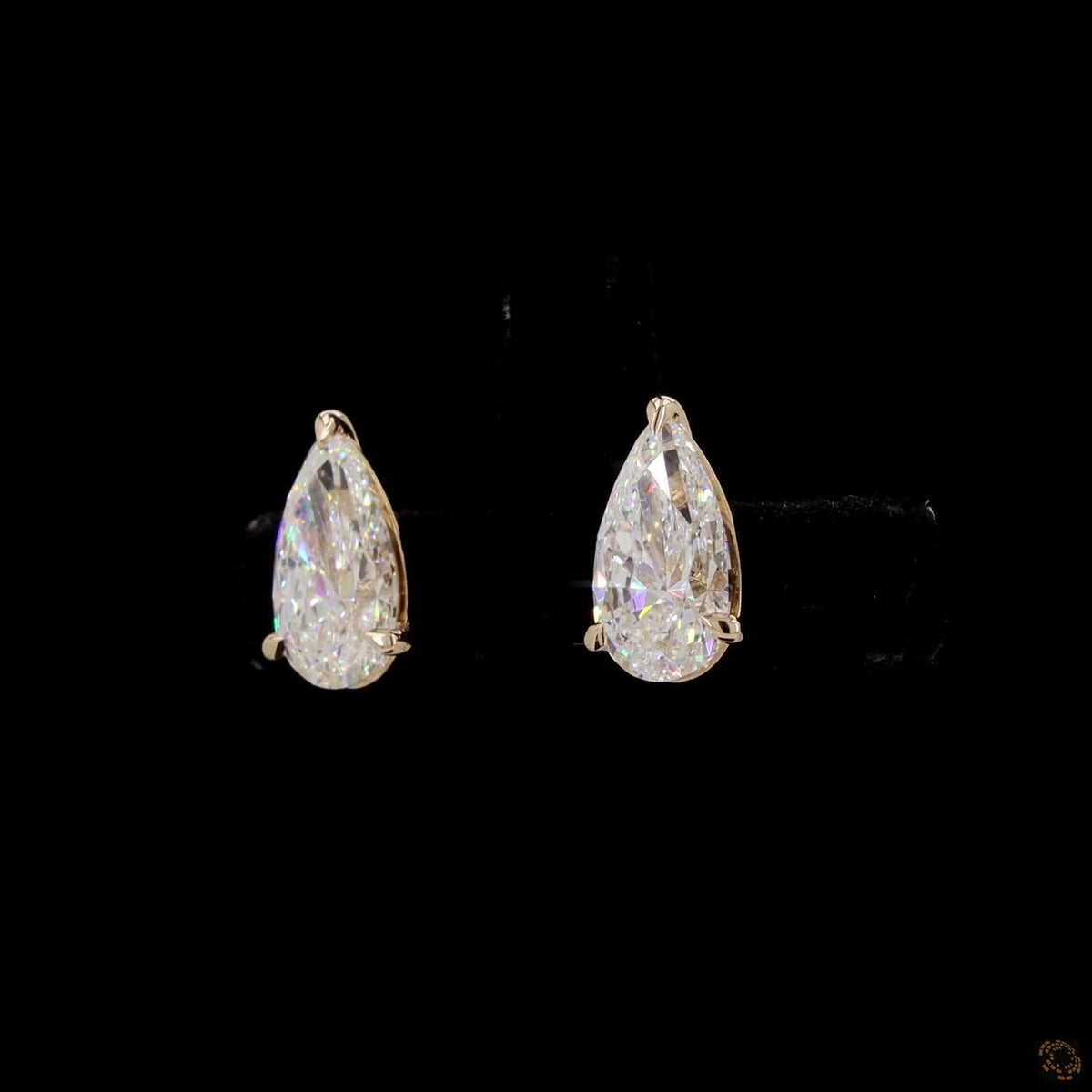 3.01 Ct Three-Prong Pear Cut Diamond Stud Earrings in Yellow Gold