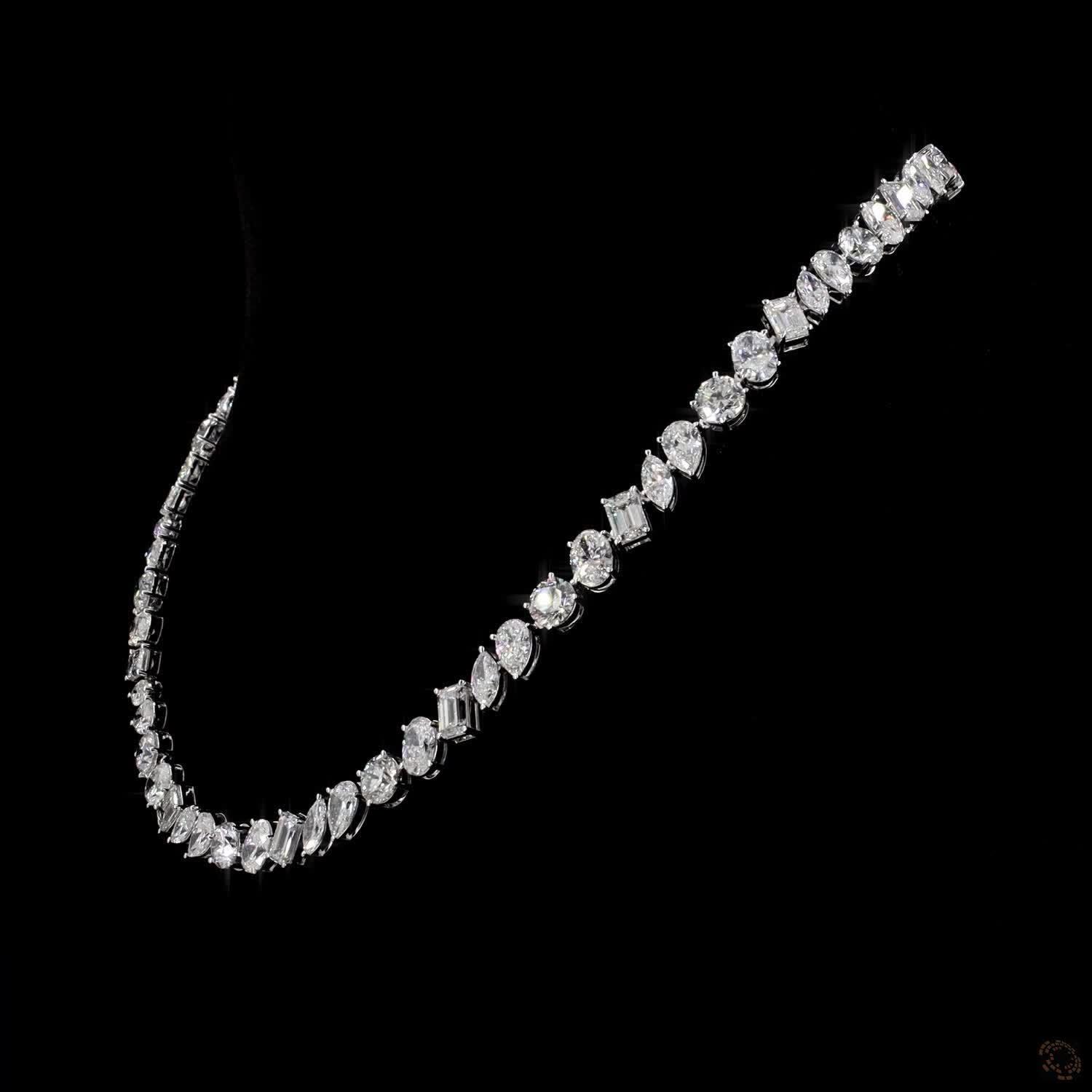 40.61 Ct High-clarity multi-shape diamonds, including round brilliant, oval, emerald, marquise, and pear cuts