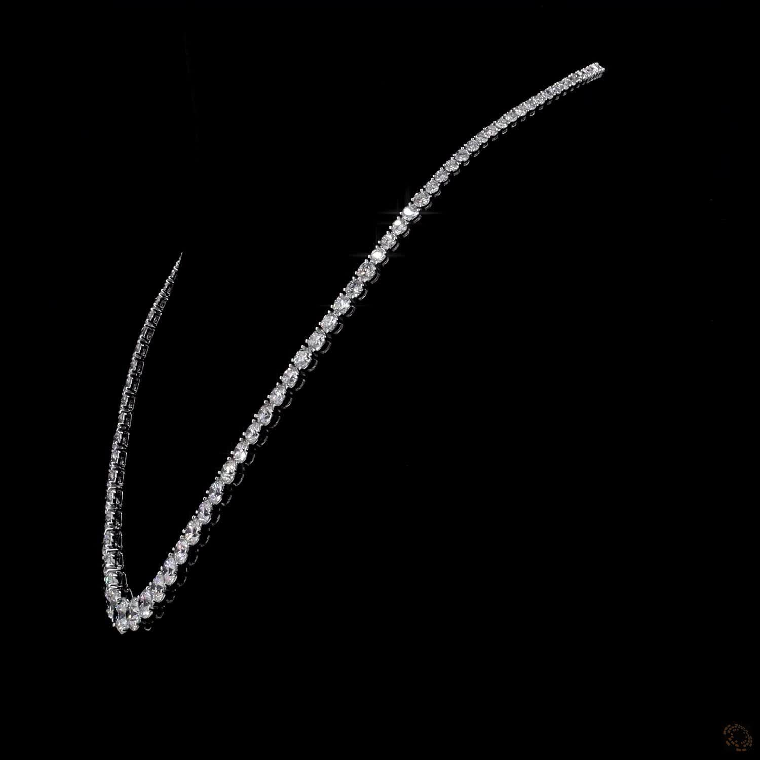 29.02 Ct Round Brilliant Cut diamonds seamlessly graduated from prominent center stones down to smaller accent stones toward the clasp