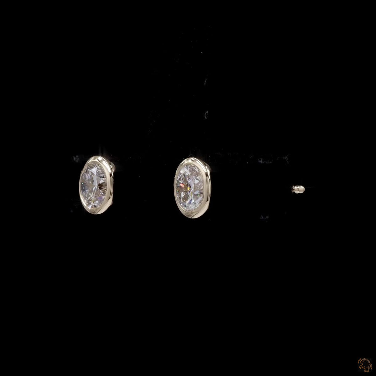 1.01 Ct Bezel-Set Round  Solitaire Diamond Stud Earrings in Yellow Gold