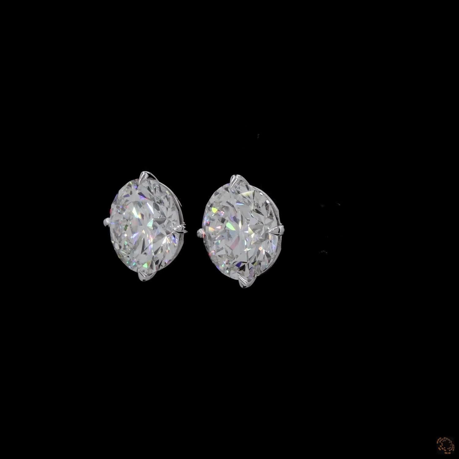 12.05 Ct Timeless single-stone solitaire design mounted in a sleek, architectural open-basket setting for optimal light entry