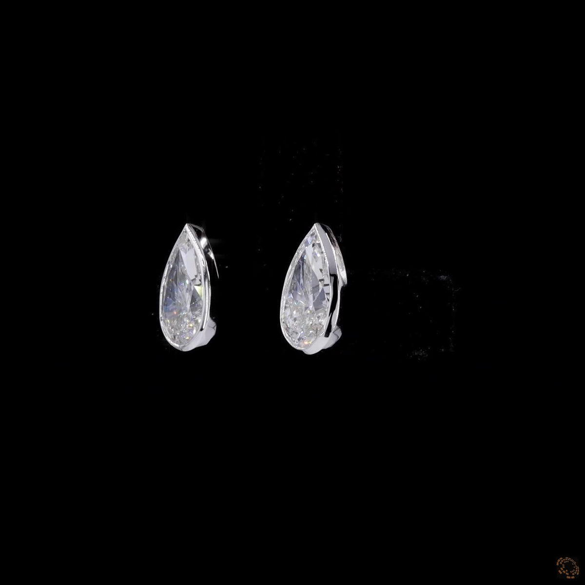 2.07 Ct Bezel-Set Pear Cut Solitaire Diamond Stud Earrings in White Gold