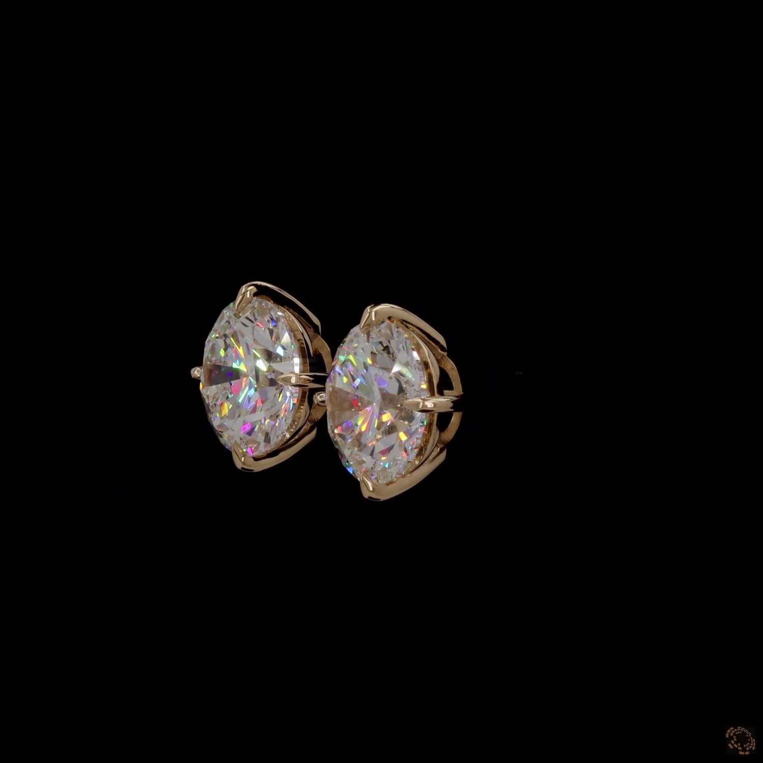 12.07 Ct Minimalist single-stone solitaire studs set in a delicate, architectural basket mount