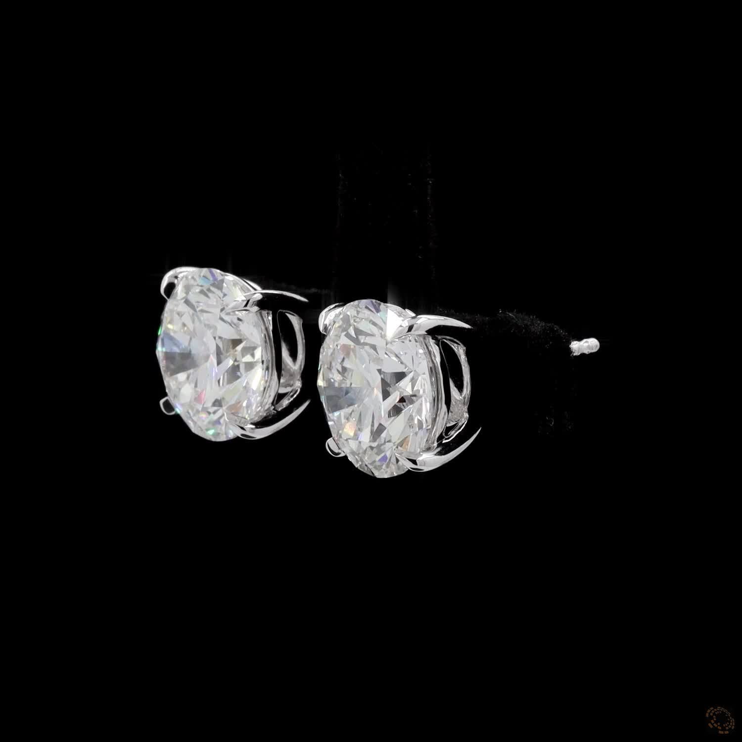 8.02 Ct A precise metal border fully encircles each diamond girdle, keeping the edges protected from bumps or chipping
