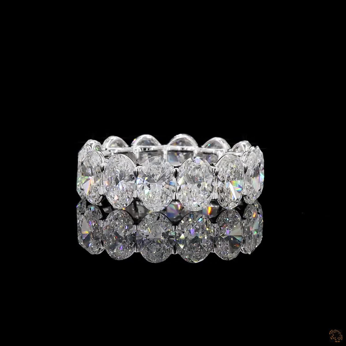 7.24 Ct Oval Cut Diamond Eternity Band set in white gold with vertically aligned oval stones