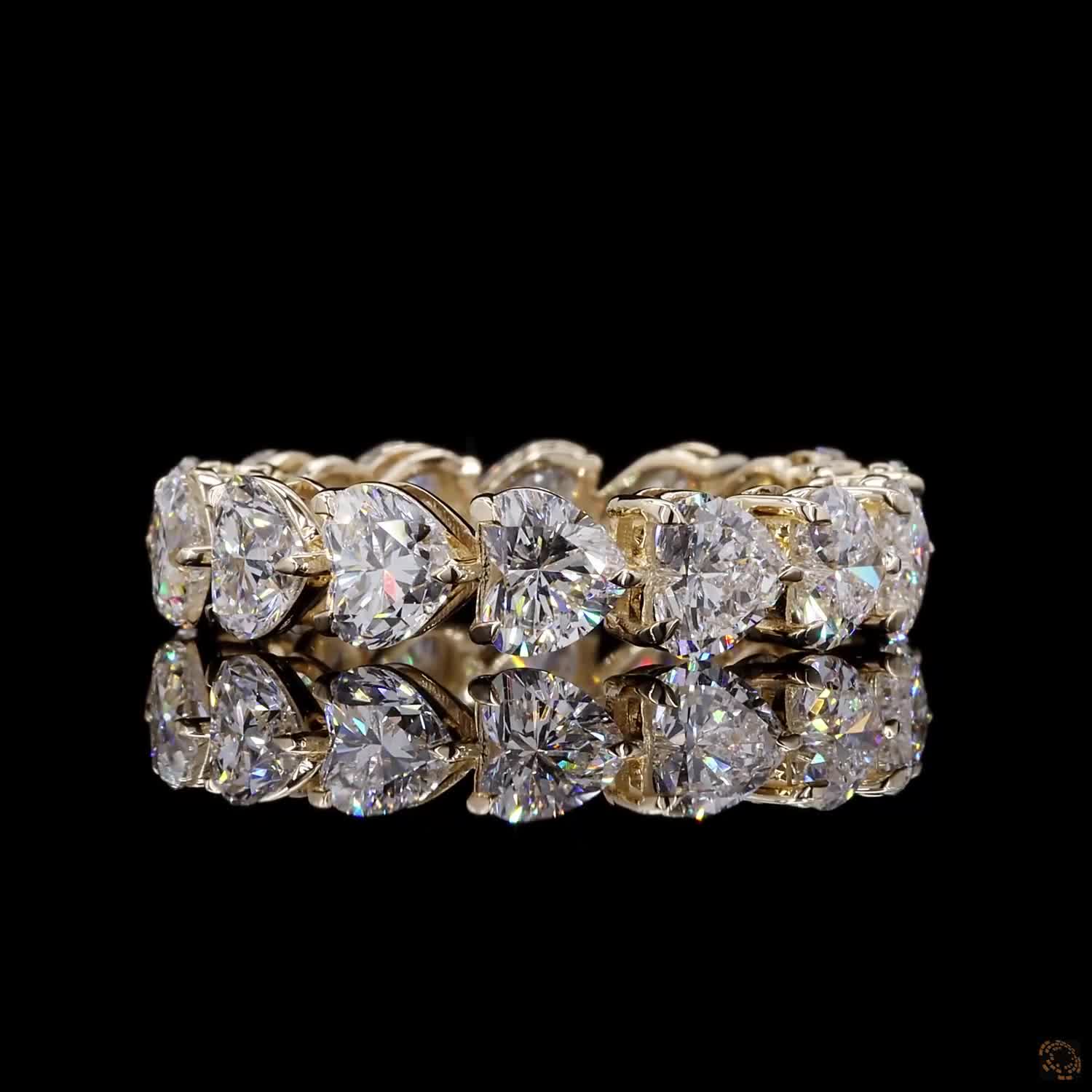5.44 Ct Full eternity band featuring a continuous row of horizontally aligned east-west oriented heart-cut diamonds seamless set end-to-end around the entire band