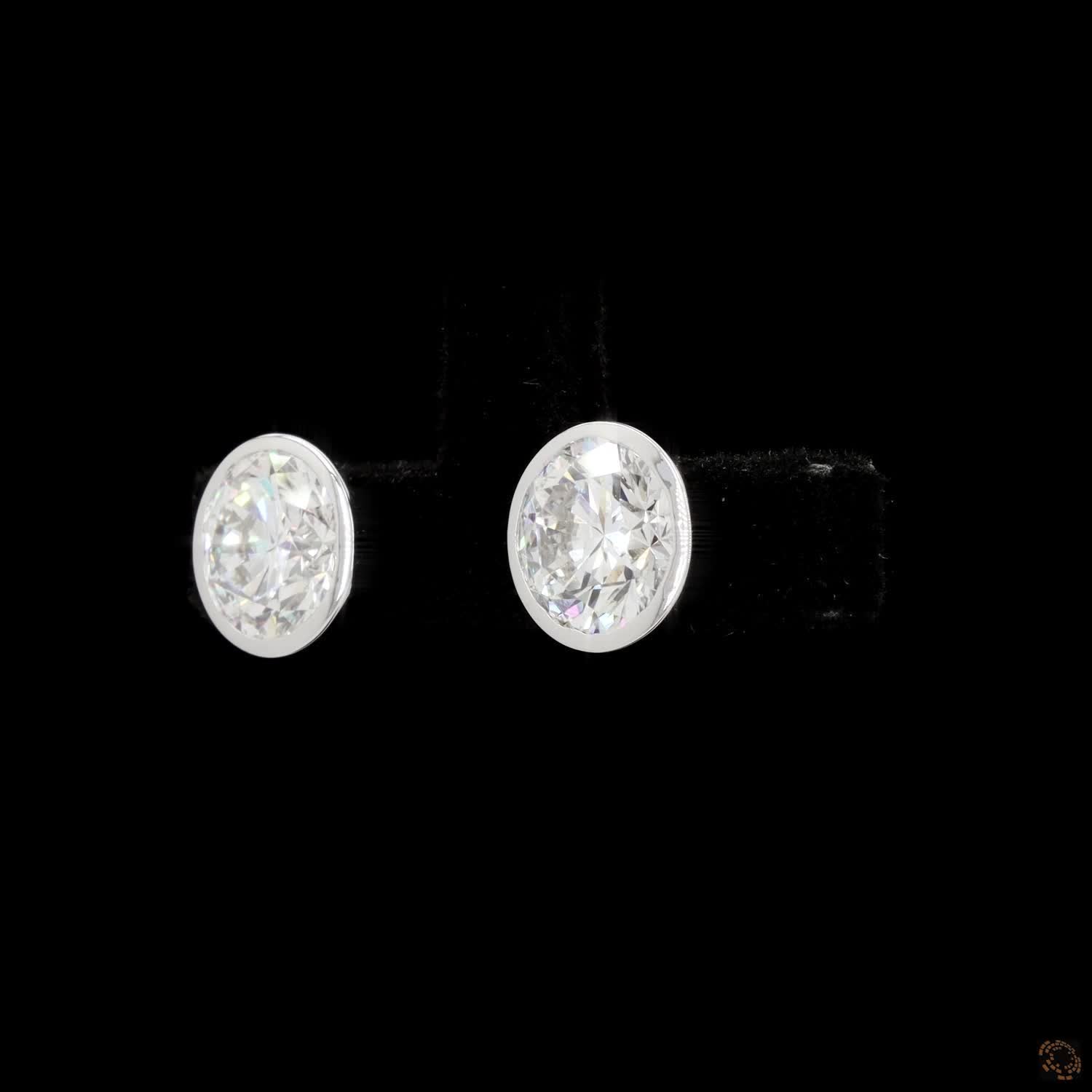 3.08 Bezel-Set Oval Cut Diamond Stud Earrings in White Gold