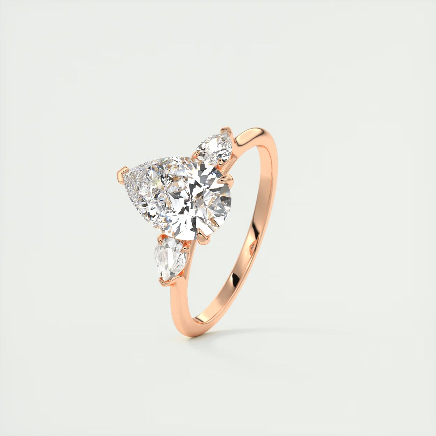 2.50 Ct Breezy Pears - Flush Stacking Pear Three Stone Solitaire Side Stone Rings