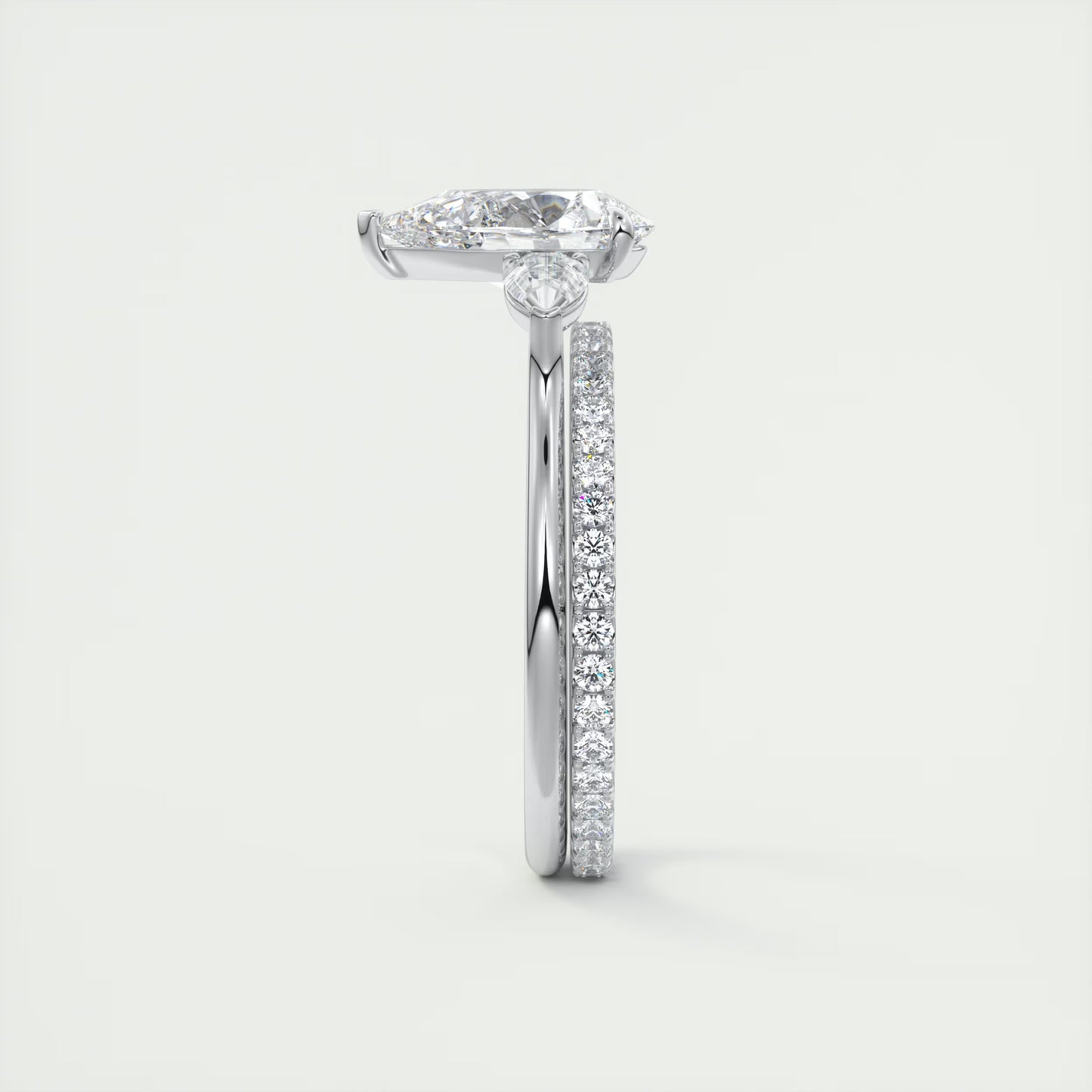 2.50 Ct Breezy Pears - Flush Stacking Pear Three Stone Solitaire Side Stone Rings