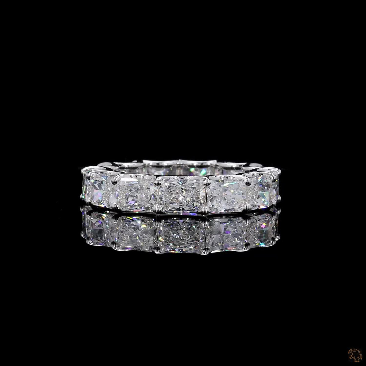 7.1 Ct East-West Radiant Cut Diamond Eternity Band set in white gold  with horizontally aligned stones and a scalloped open-gallery basket setting