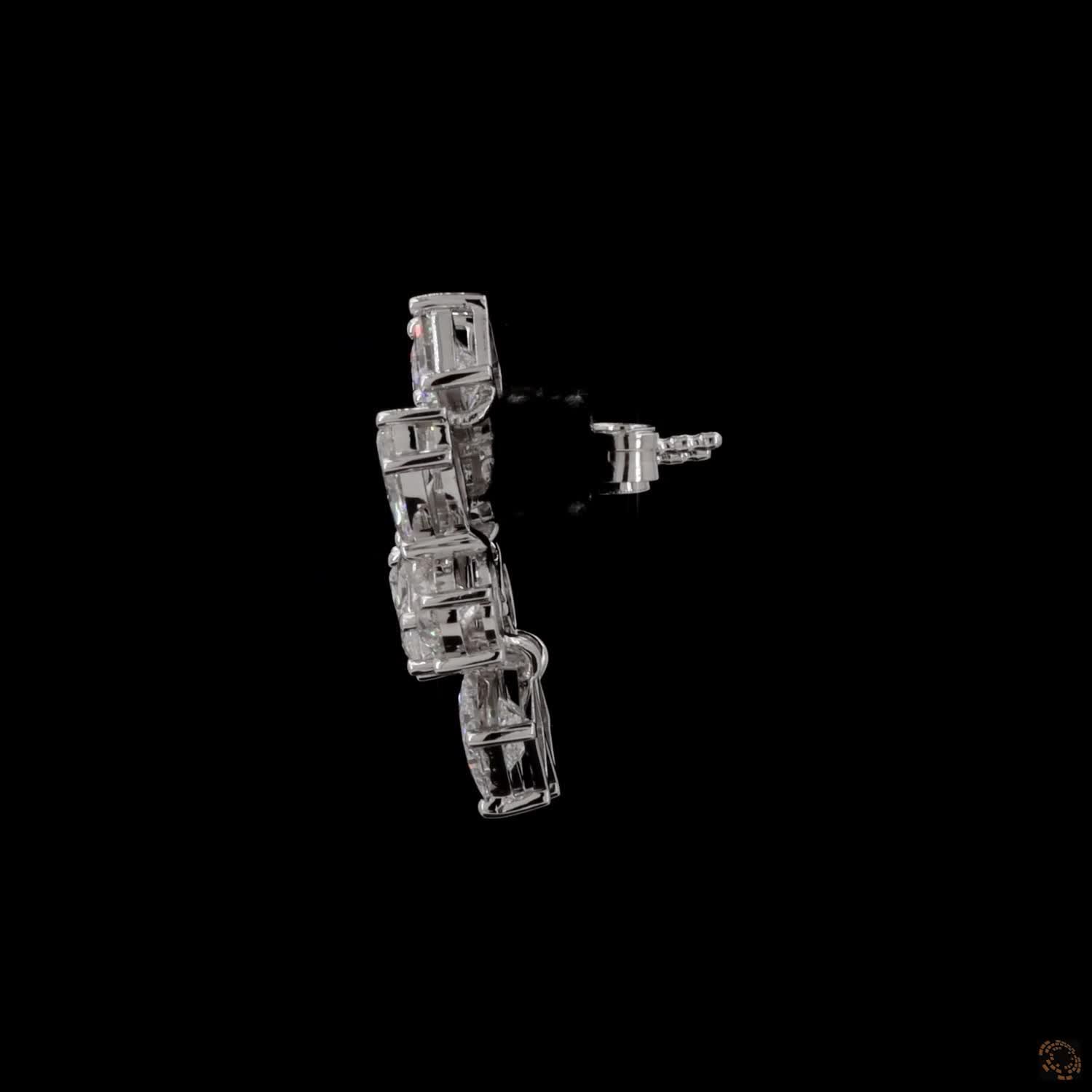 5.6 Ct Vertical cascading cluster capped at the top and bottom by kite-set princess-cut diamonds, sandwiching an alternating pattern of marquise and round brilliant stones