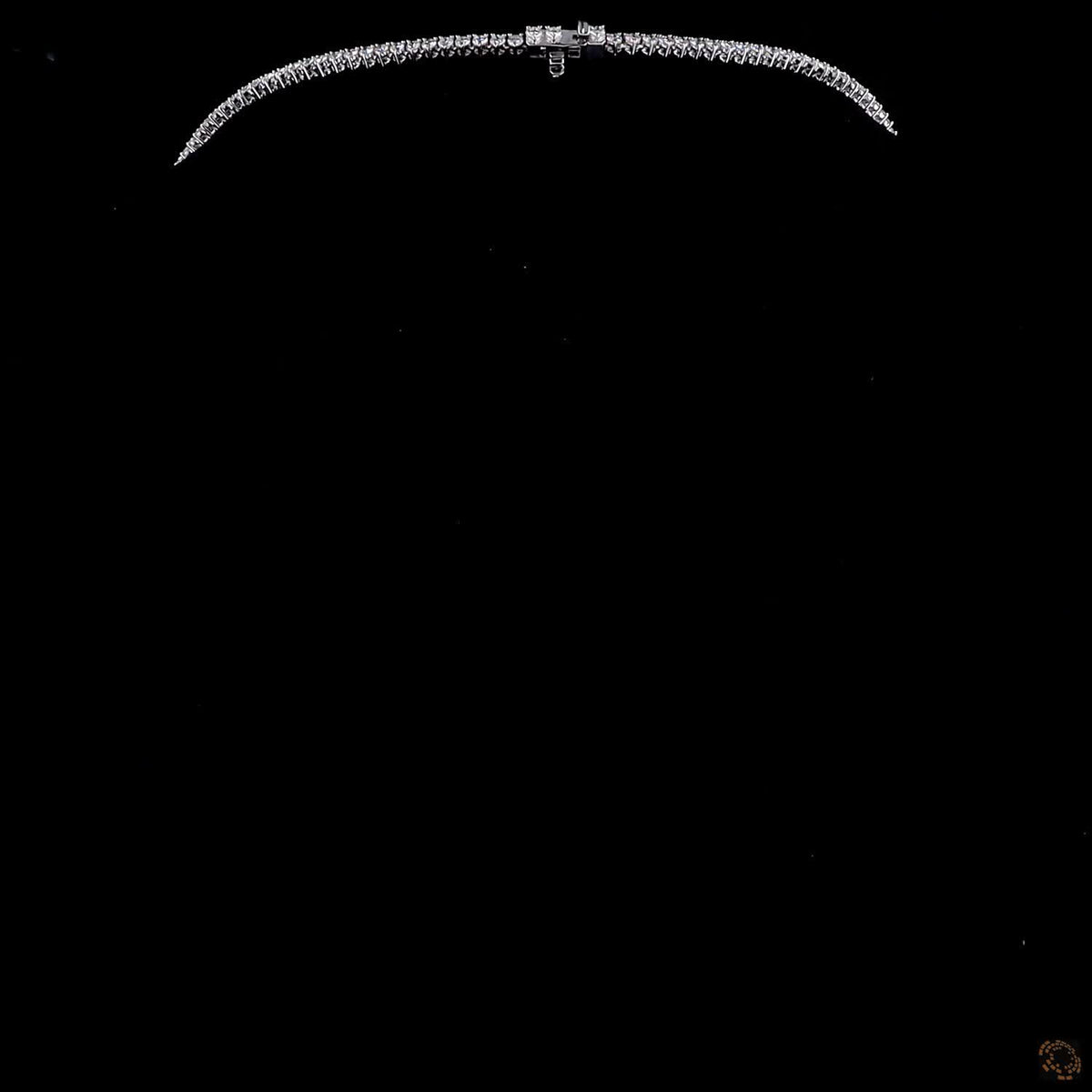 9.74 Ct Graduated stones range from subtle accent carats near the clasp to larger carat sizes along the center focal curve