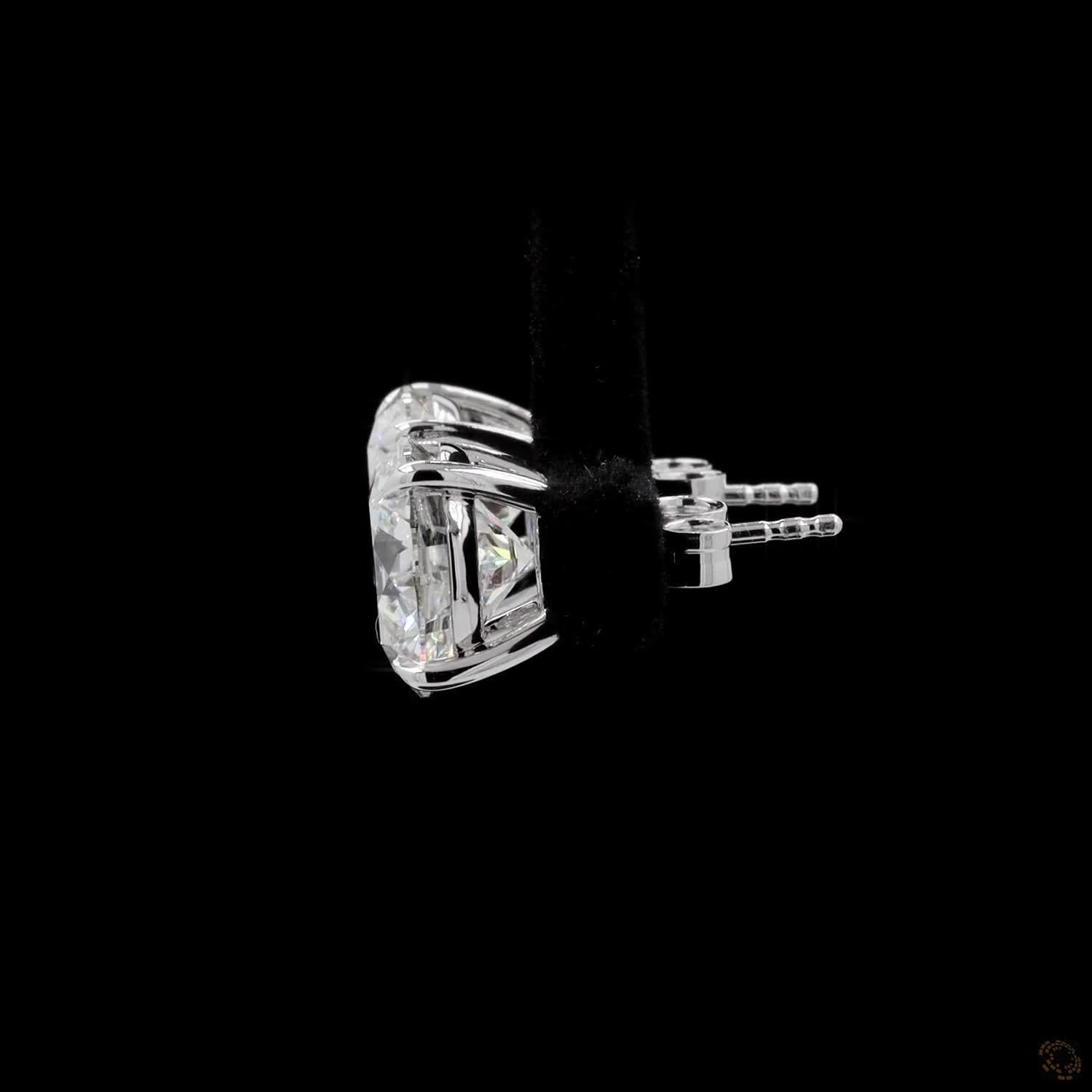 8.02 Ct A precise metal border fully encircles each diamond girdle, keeping the edges protected from bumps or chipping
