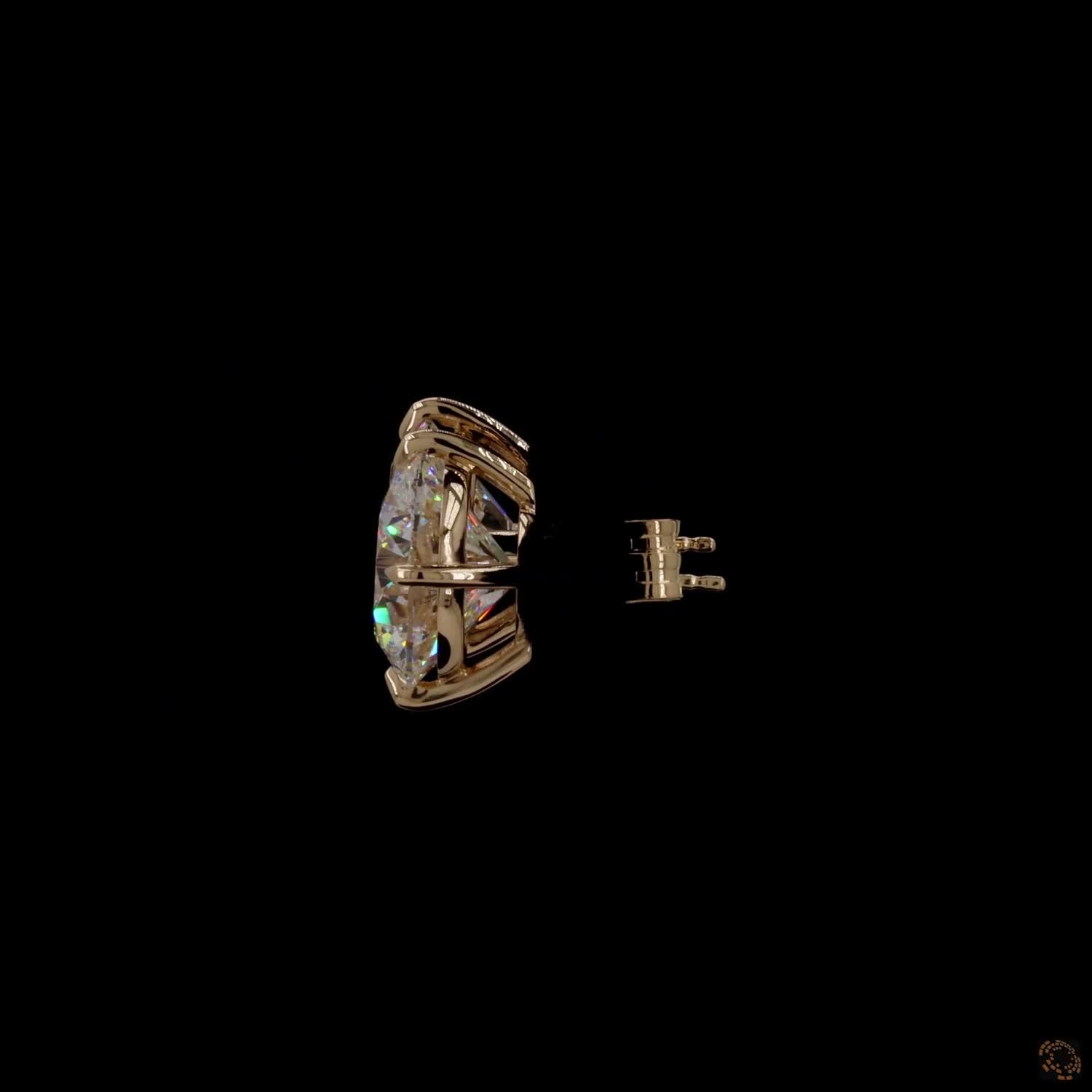 12.07 Ct Minimalist single-stone solitaire studs set in a delicate, architectural basket mount