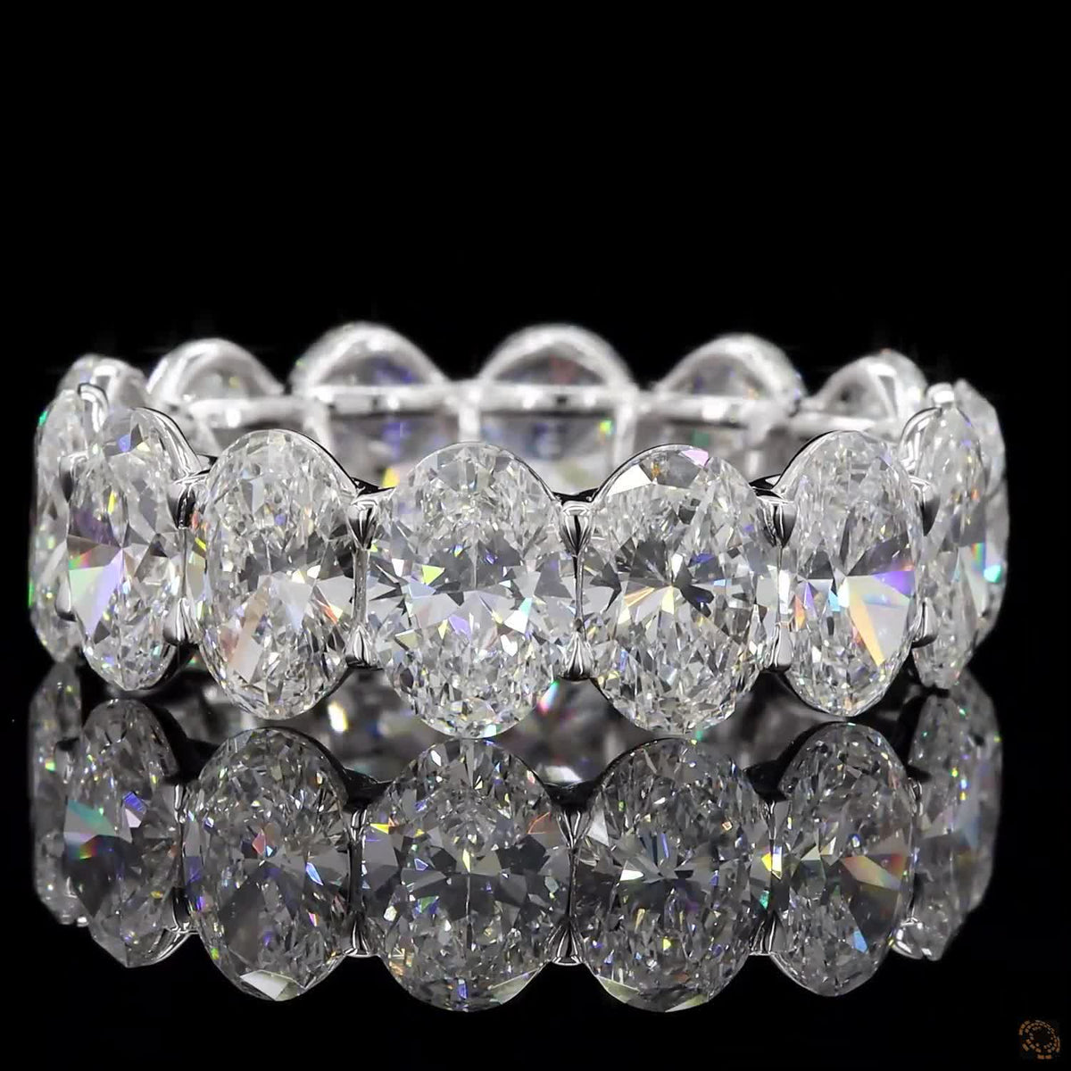 7.24 Ct Oval Cut Diamond Eternity Band set in white gold with vertically aligned oval stones