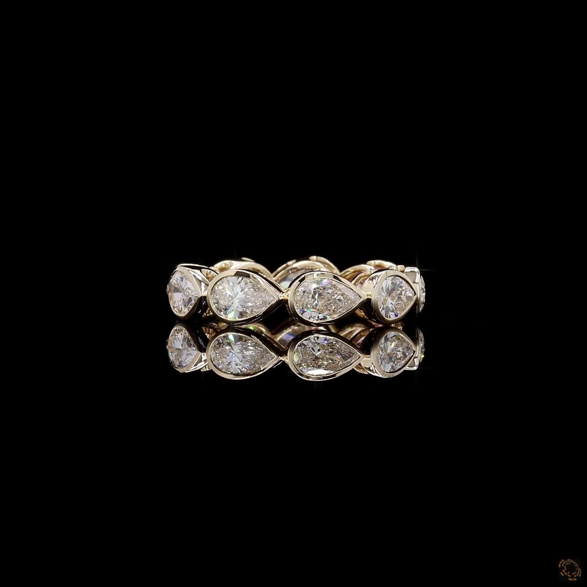 2.47 Ct East-West Bezel-Set Pear Diamond Eternity Band with Pink Sapphire Accent in Yellow Gold