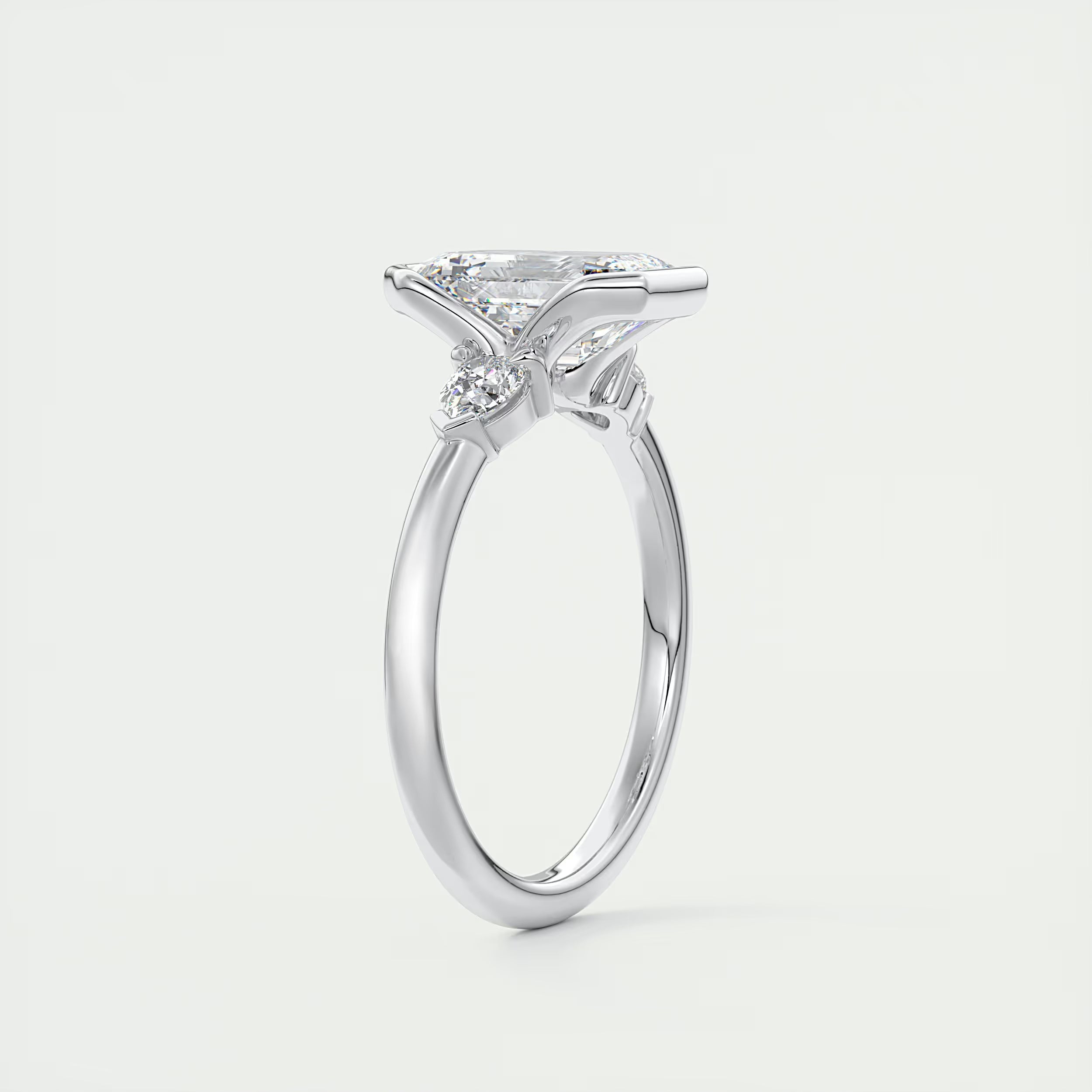 2.50Ct Center Stone Emerald & Side Stone Pear - Engagement Rings