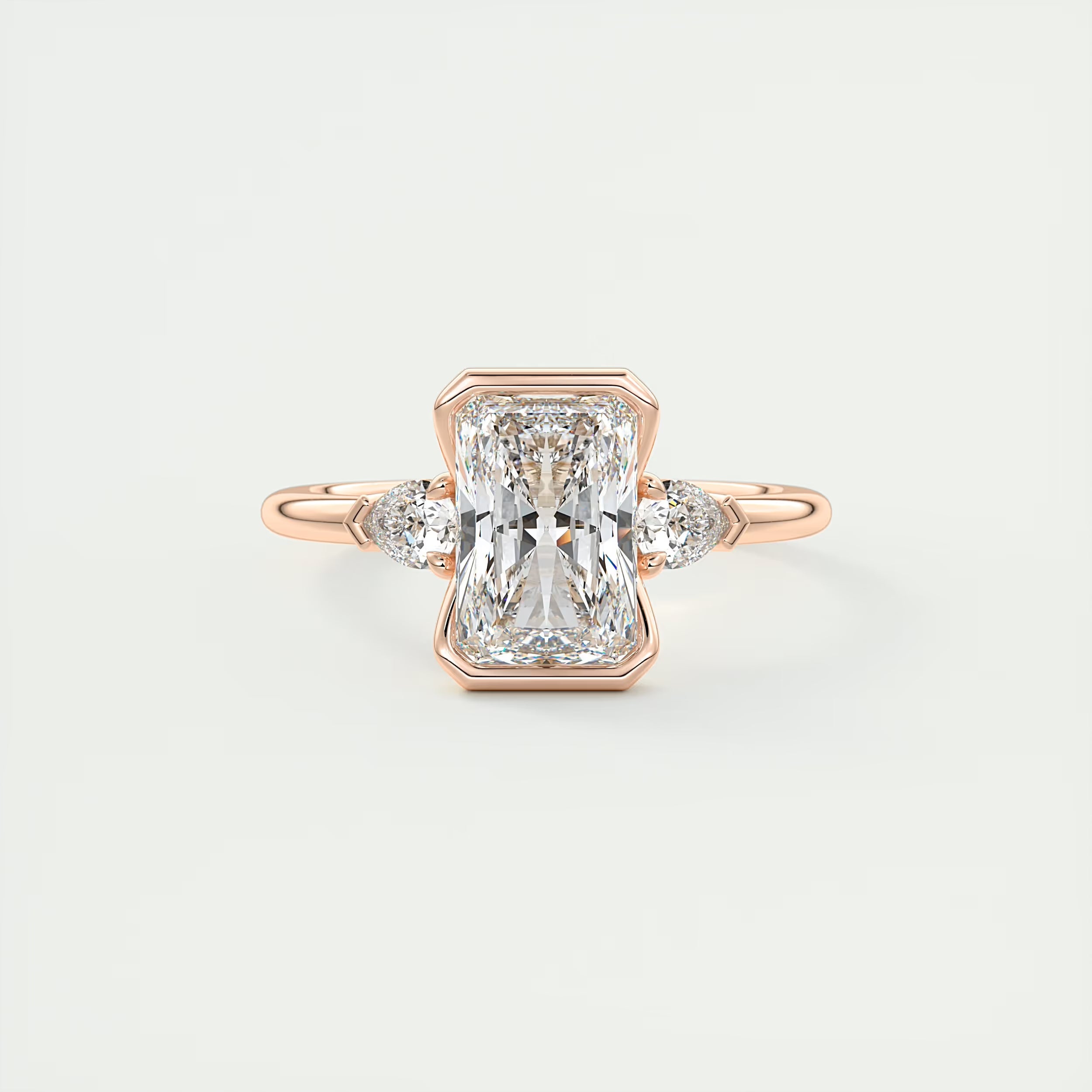 2.50 Ct Clutch Radiant & Pear Three Stone Engagement Rings