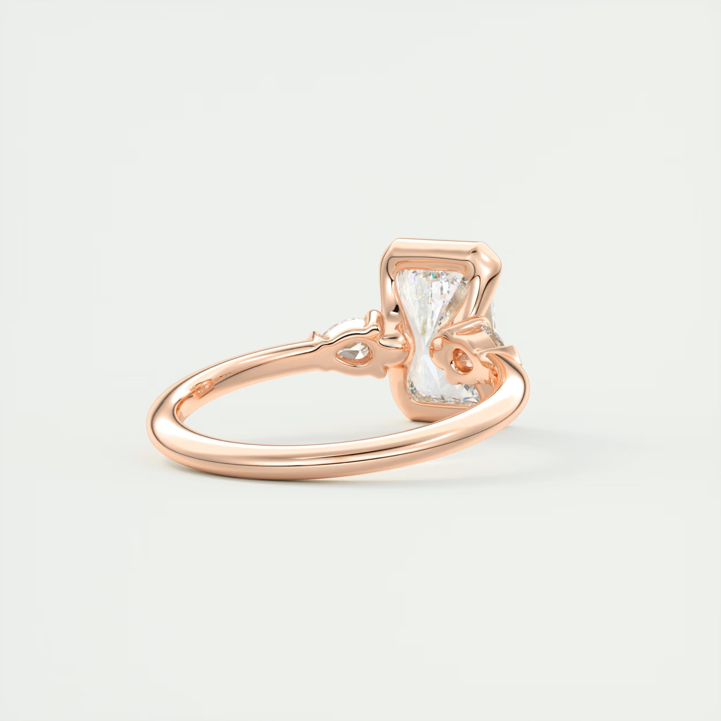 2.50 Ct Clutch Radiant & Pear Three Stone Engagement Rings