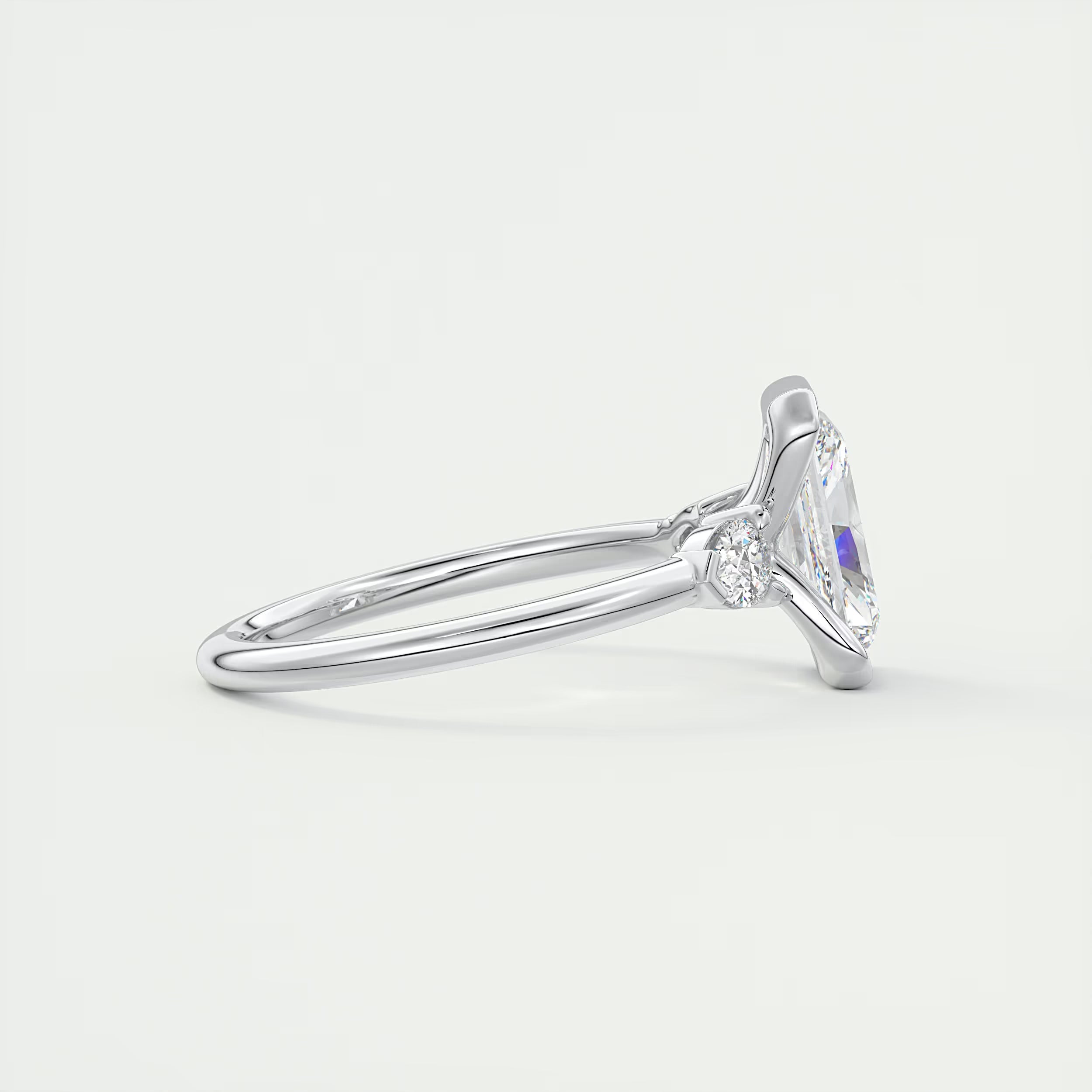 2.50 Ct Clutch Radiant & Pear Three Stone Engagement Rings