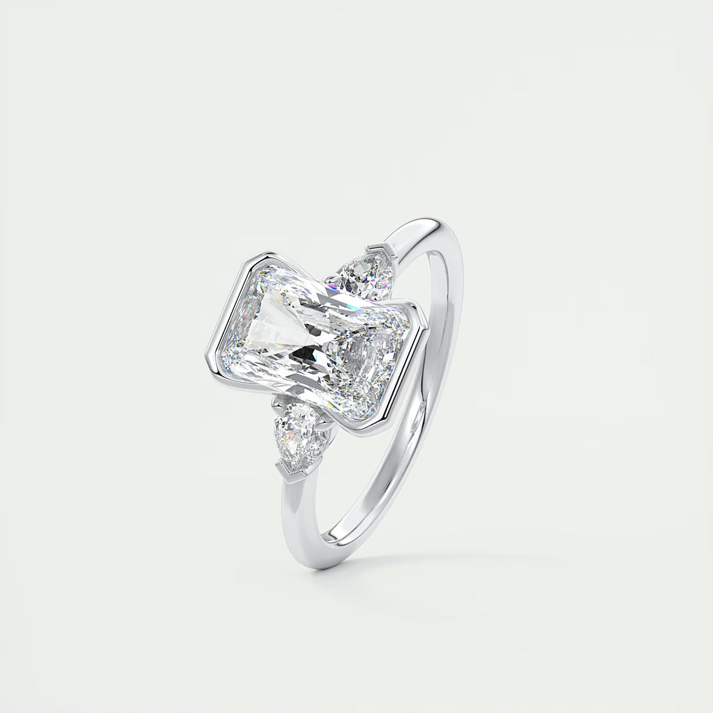 2.50 Ct Clutch Radiant & Pear Three Stone Engagement Rings