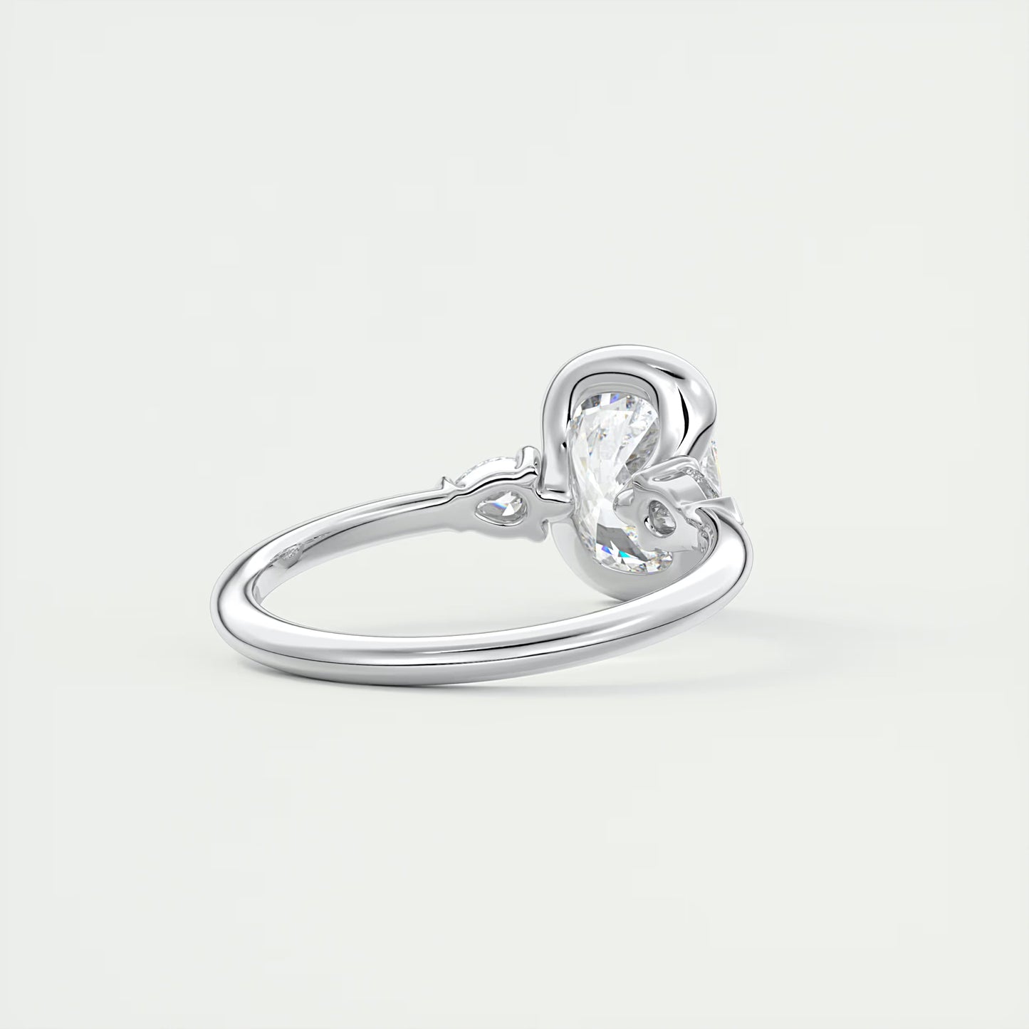 2.50 Clutch Elongated Cushion & Pears Three Stone Engagement Rings
