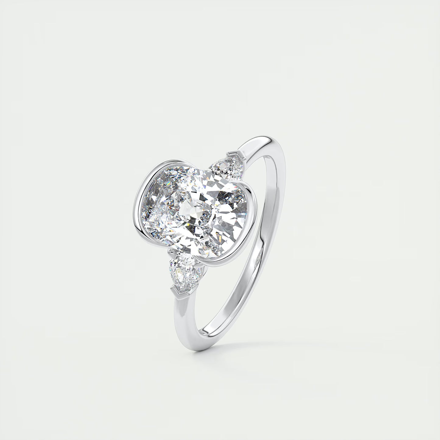 2.50 Clutch Elongated Cushion & Pears Three Stone Engagement Rings