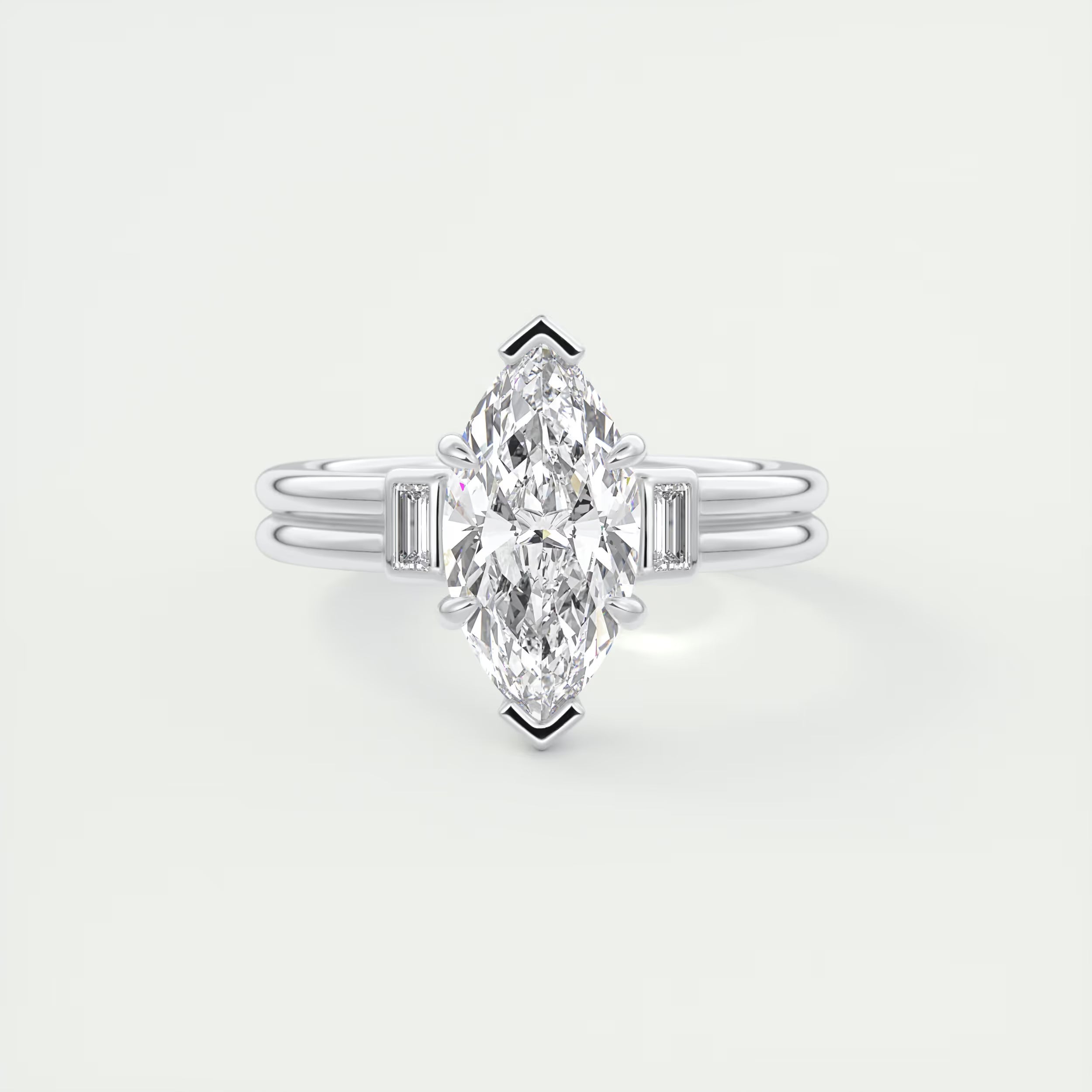 2.10 Ct The Center Stone Marquise & Side Stone Baguettes - Three Stone Engagement Rings