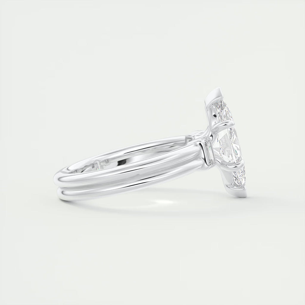 2.10 Ct The Center Stone Marquise & Side Stone Baguettes - Three Stone Engagement Rings